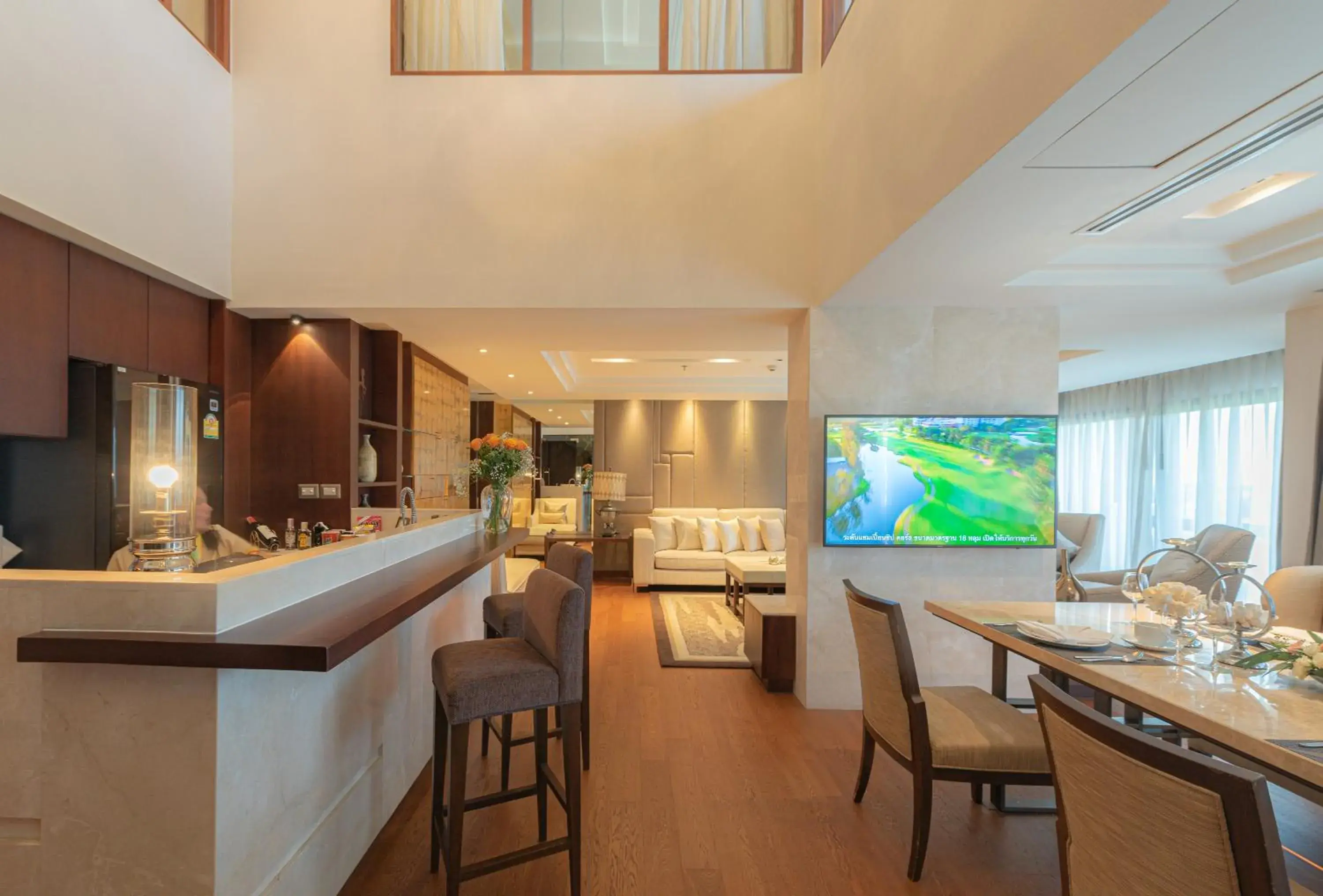Living room, Kitchen/Kitchenette in Summit Windmill Golf Residence