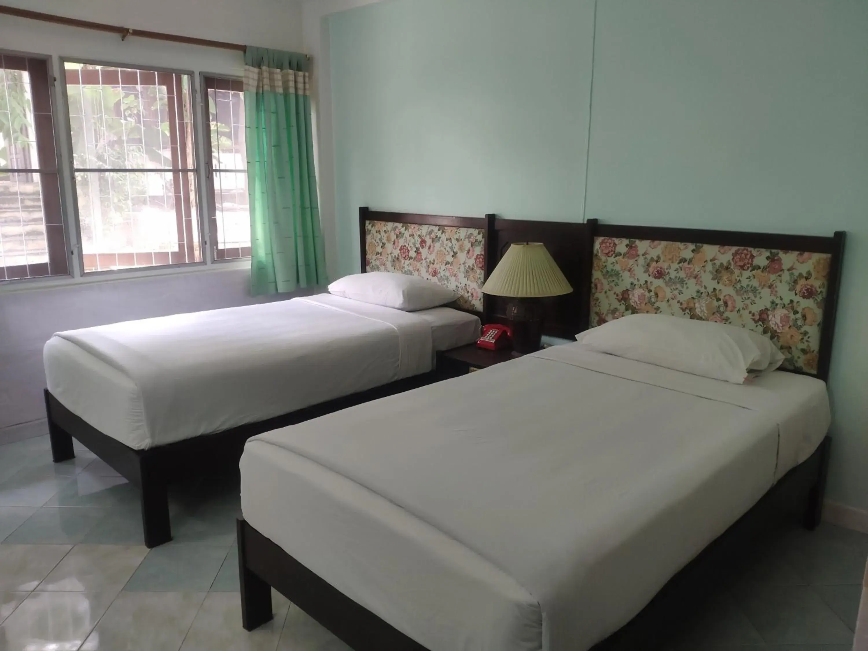 Bed in Changpuak Hotel