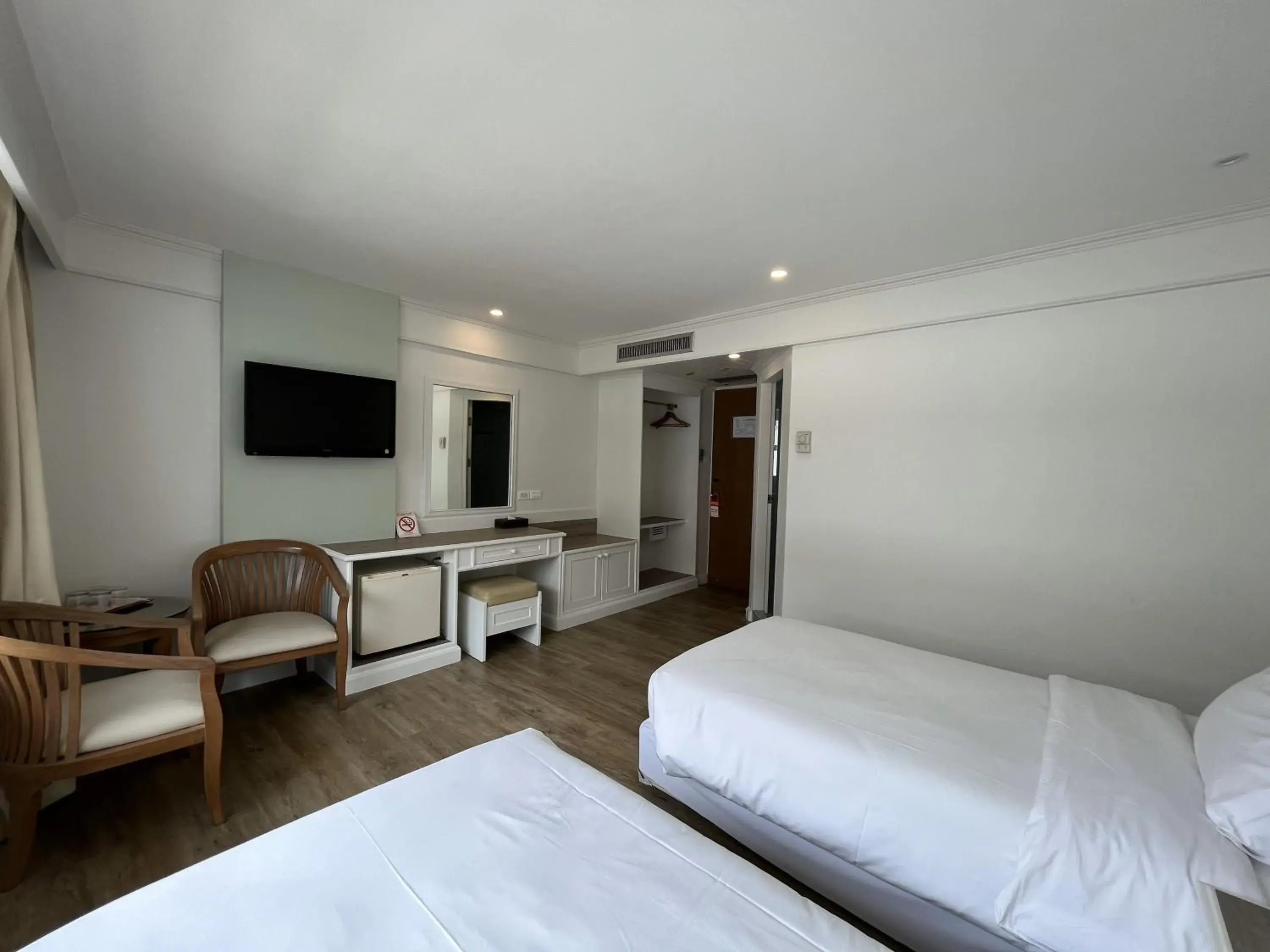 Bedroom, TV/Entertainment Center in Dhevaraj Hotel