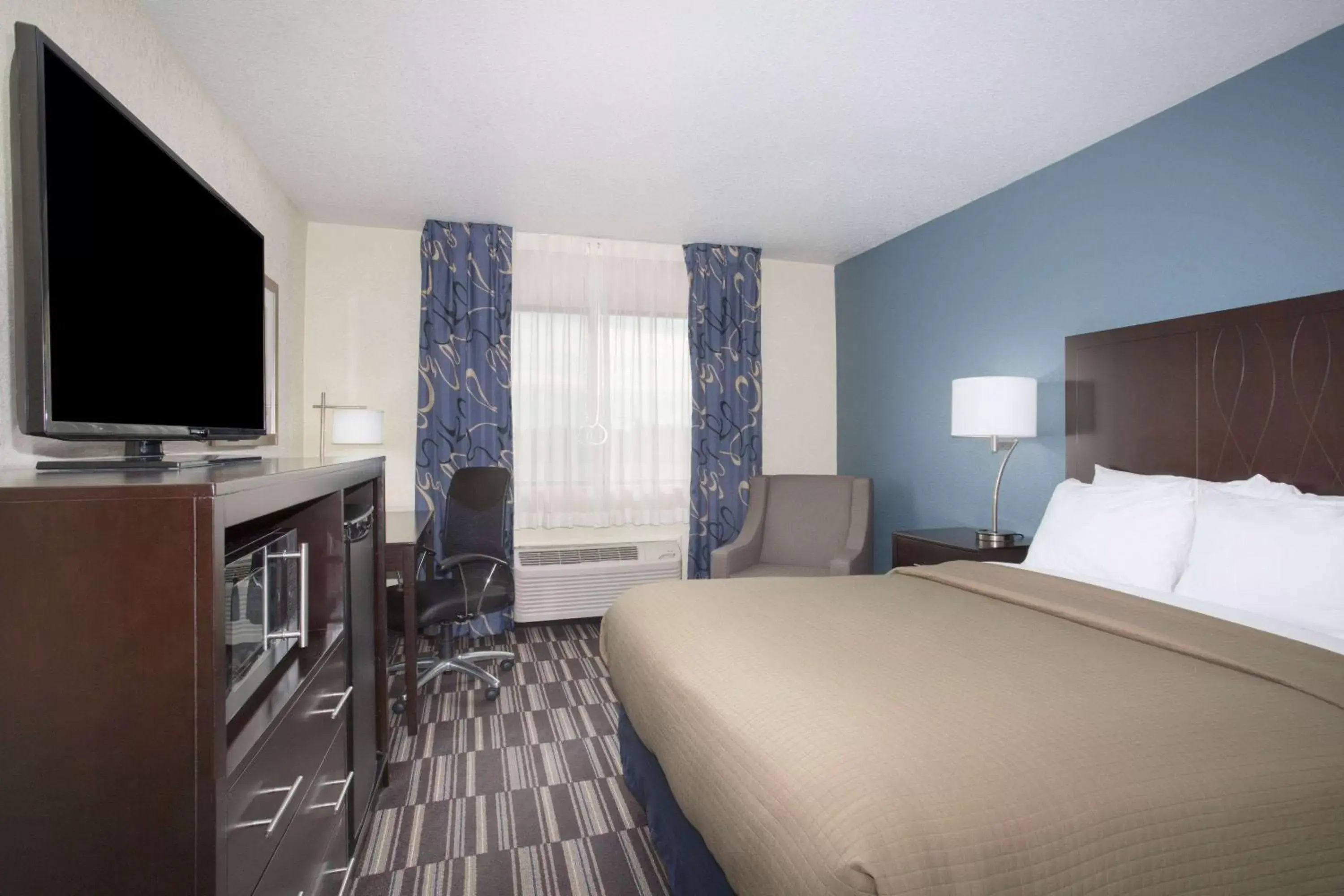 Photo of the whole room, Bed in AmericInn by Wyndham Mount Pleasant