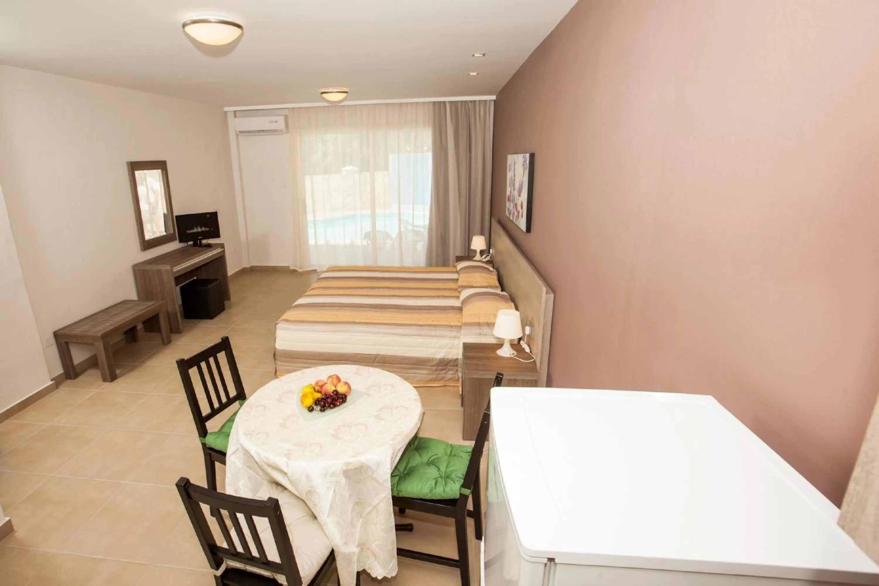 Bed in Crystallo Apartments