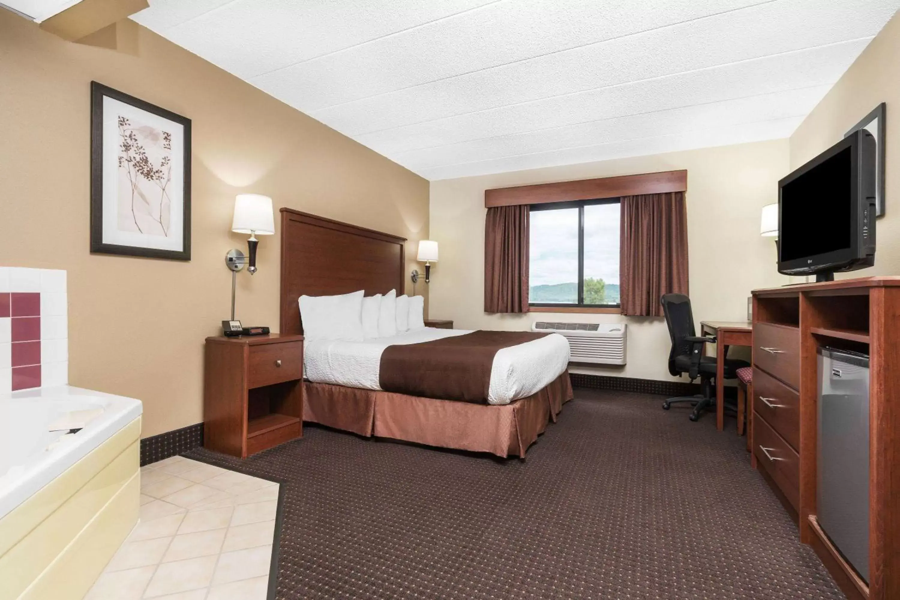 Photo of the whole room in AmericInn by Wyndham Lake City