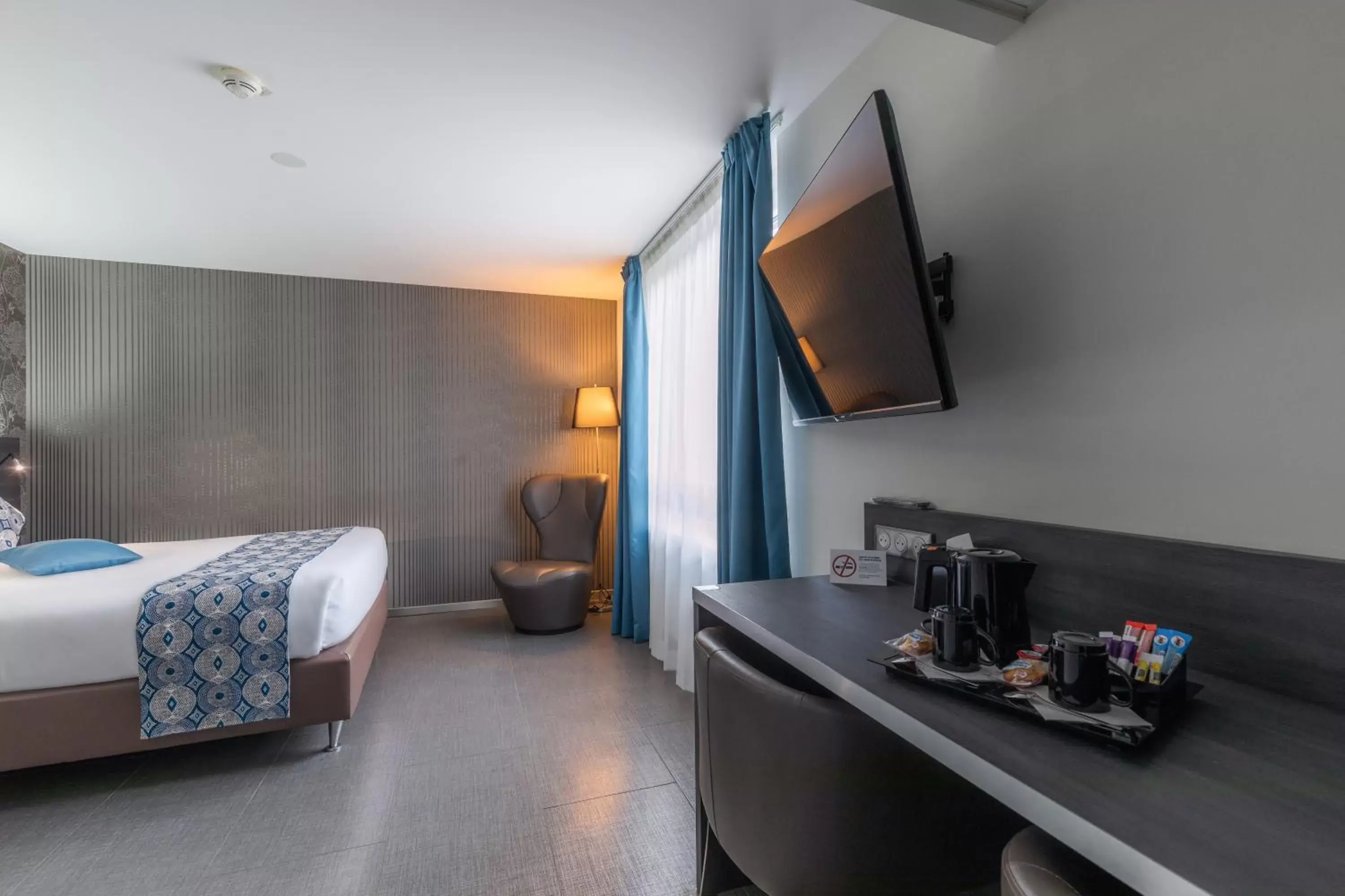 TV and multimedia, TV/Entertainment Center in Mercure Bale Mulhouse Aeroport