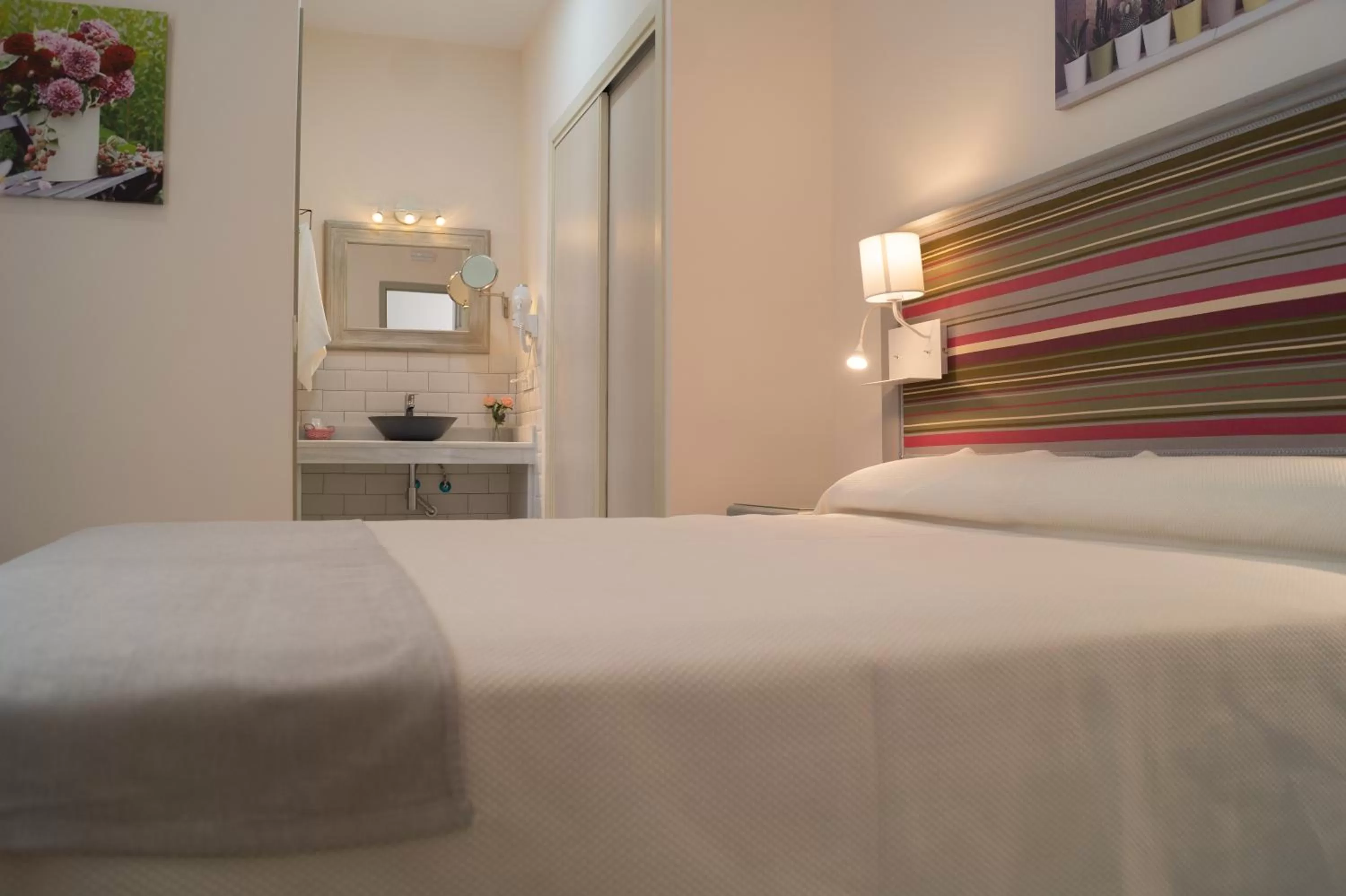 Bed in Hospedería Baños Arabes de Córdoba Dos