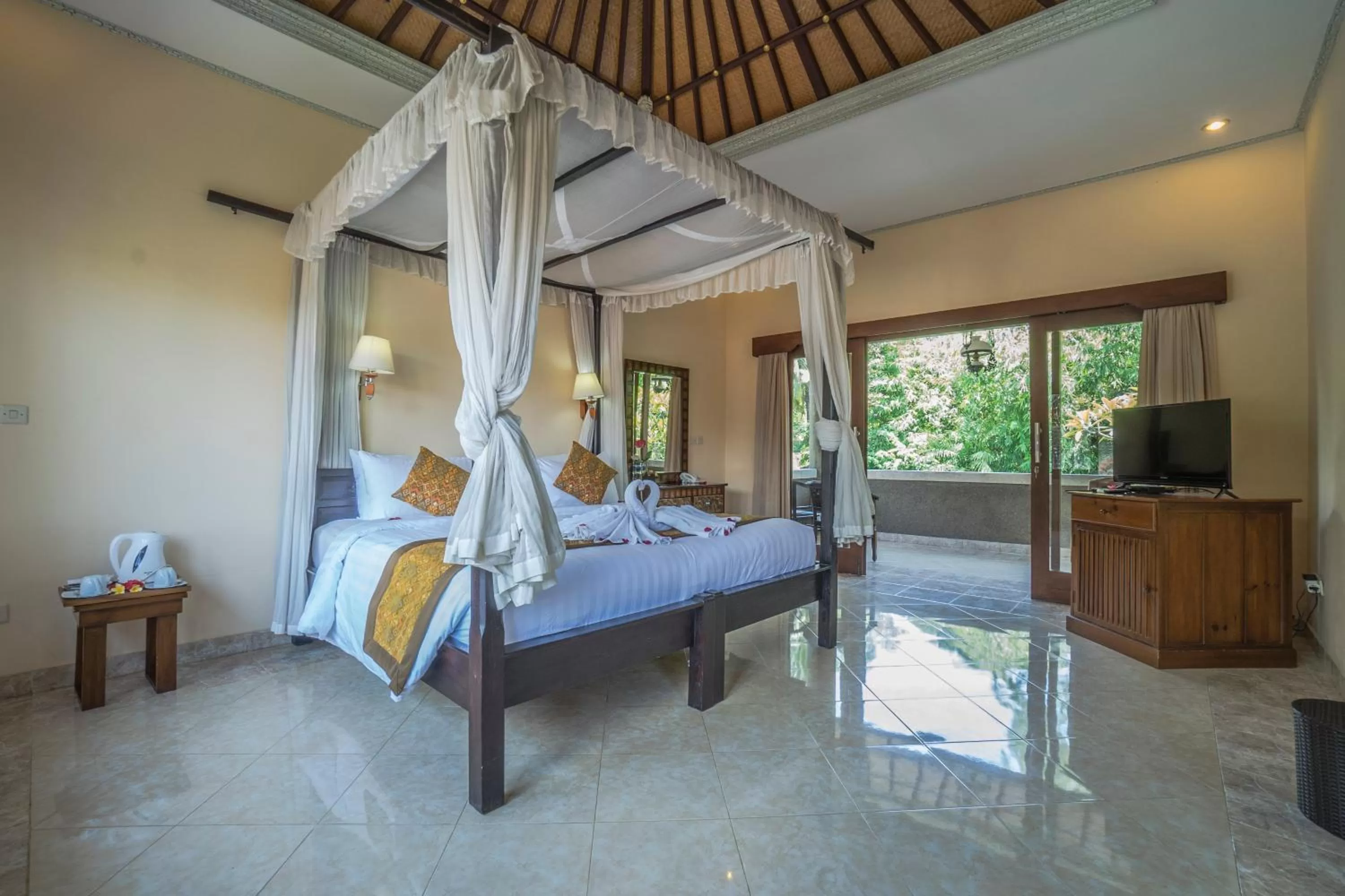 Photo of the whole room, Bed in Cendana Resort & Spa by Mahaputra