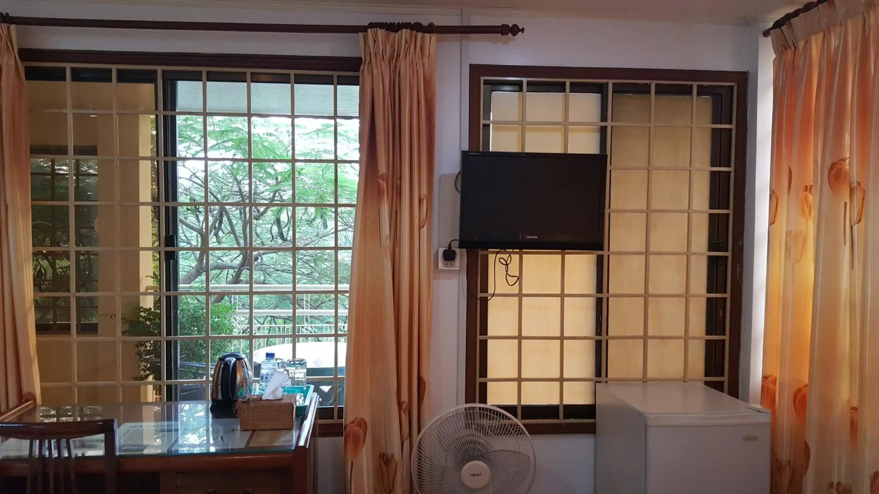 Seating area, TV/Entertainment Center in The Bright Lotus Guesthouse