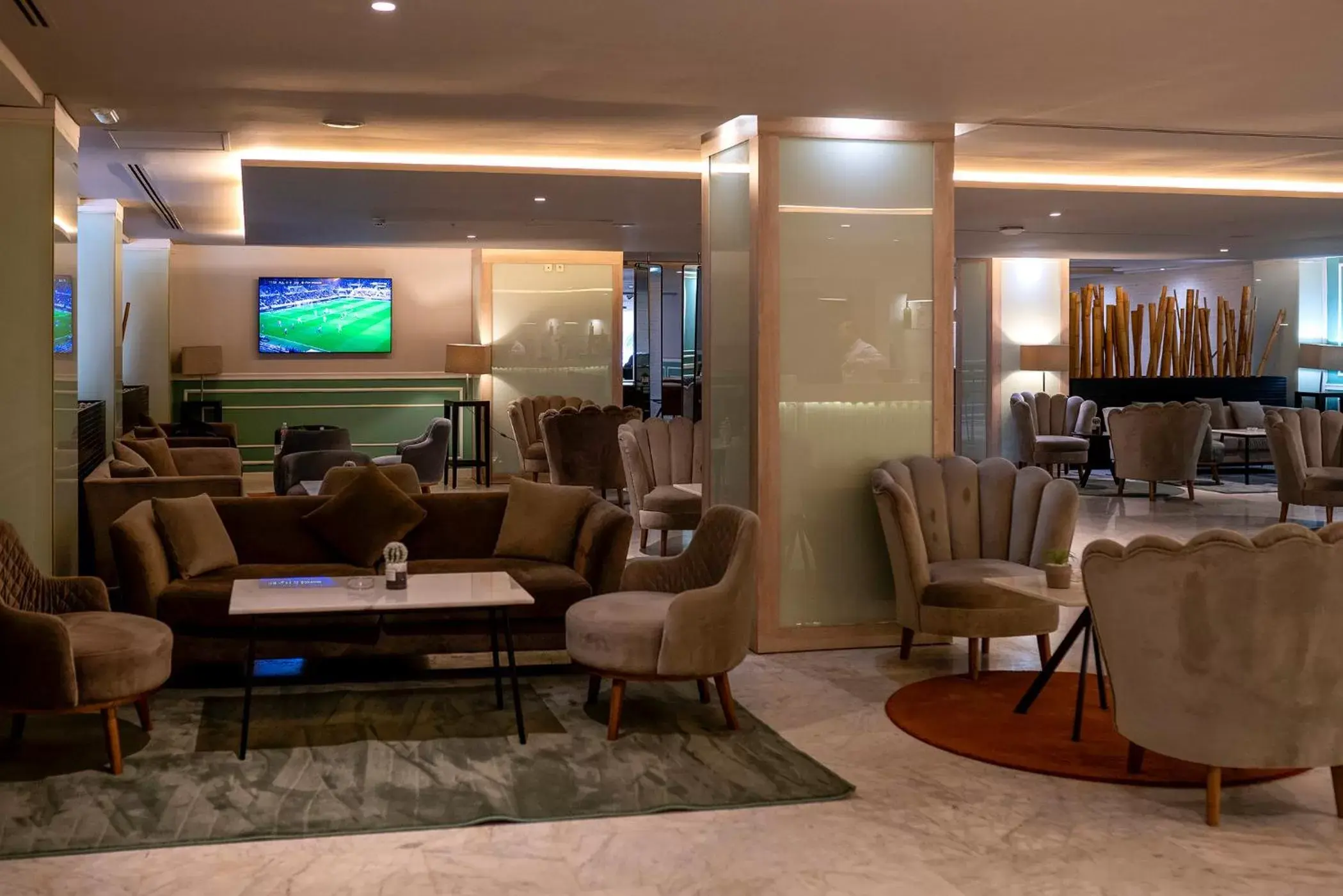 Lounge or bar in Golden Tulip El Mechtel Lounge or bar in Golden Tulip El Mechtel