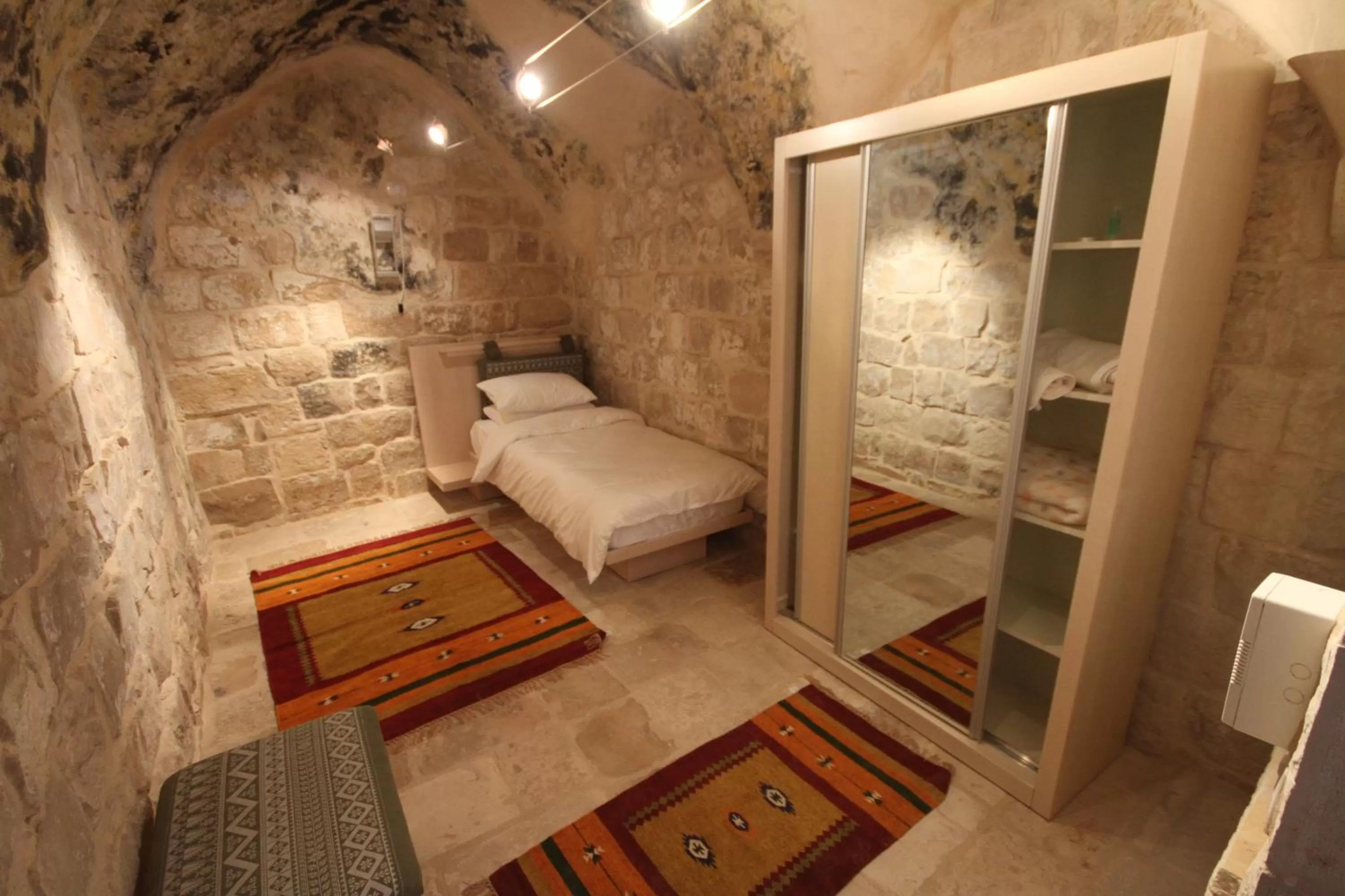 Bed in Khan Alwakala Hotel