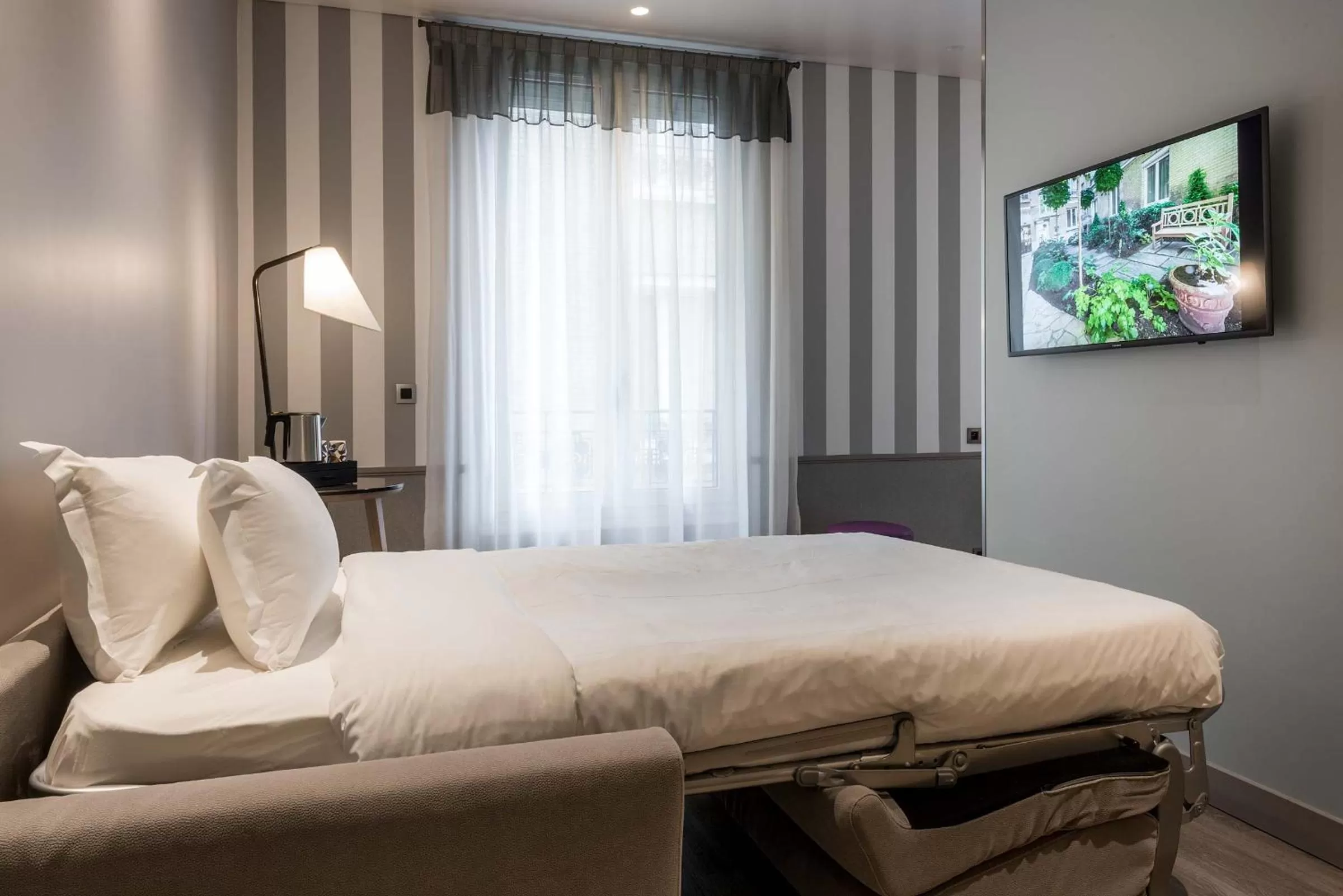 Bed in Hôtel Magellan