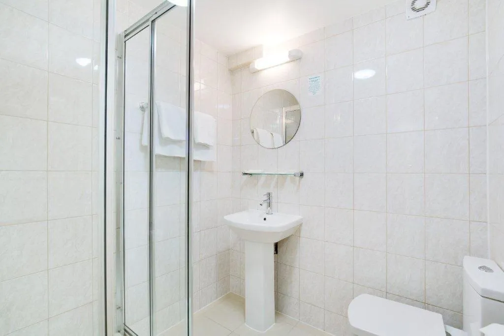 Bathroom in Queens Park Hotel
