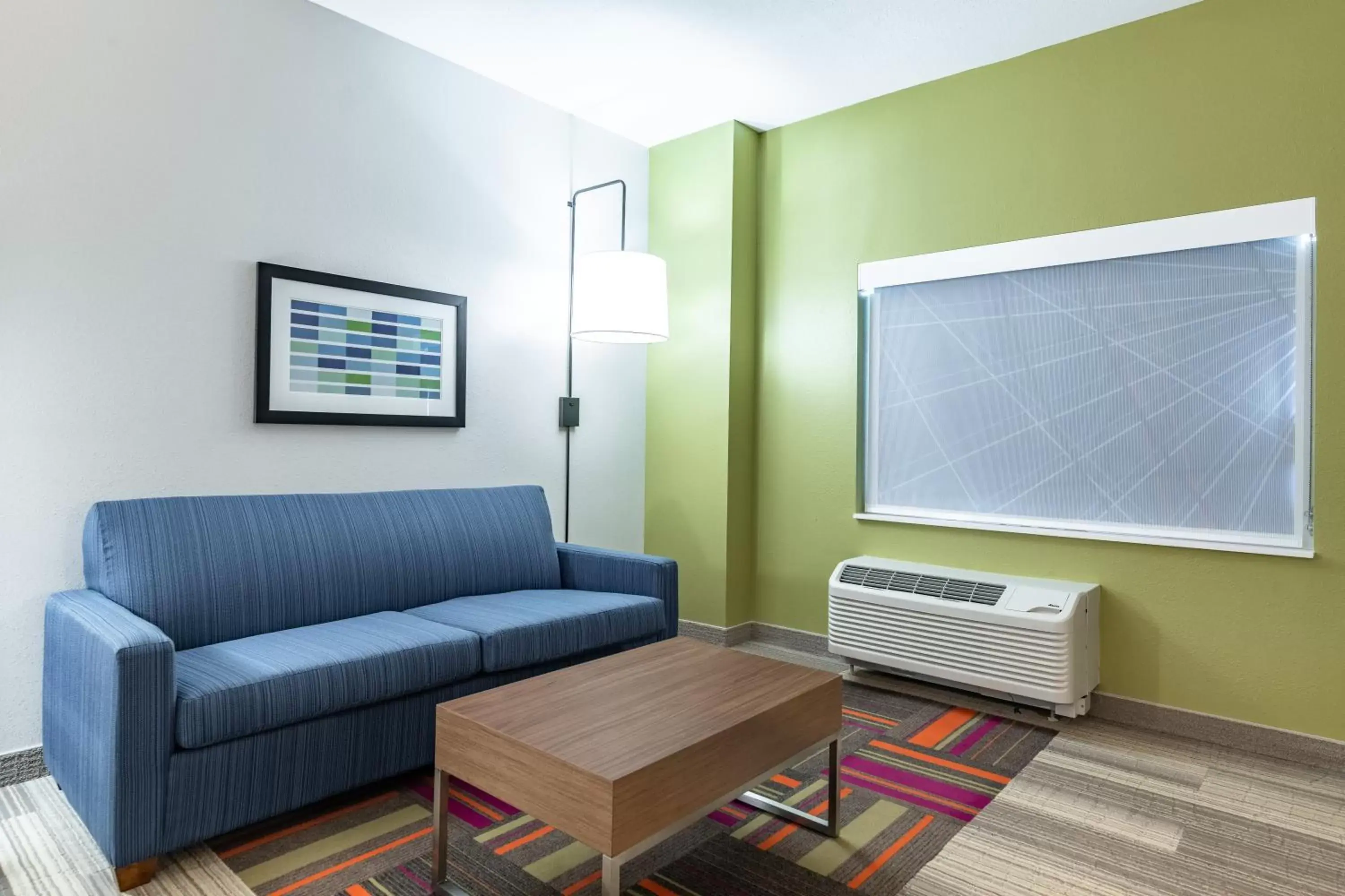 Bedroom, Seating Area in Holiday Inn Express & Suites - Moundsville, an IHG Hotel