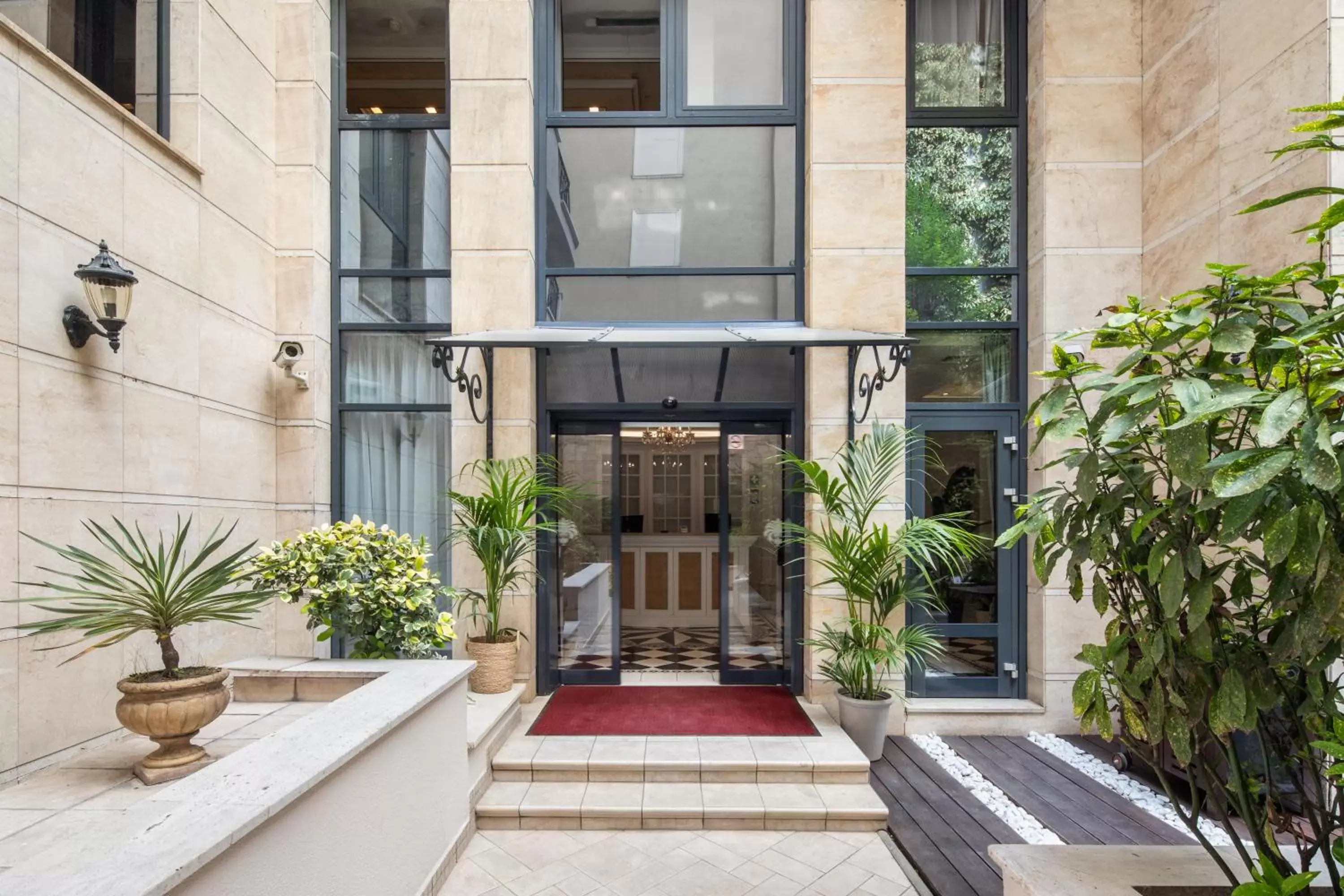 Facade/entrance in Queen's Court Hotel & Residence