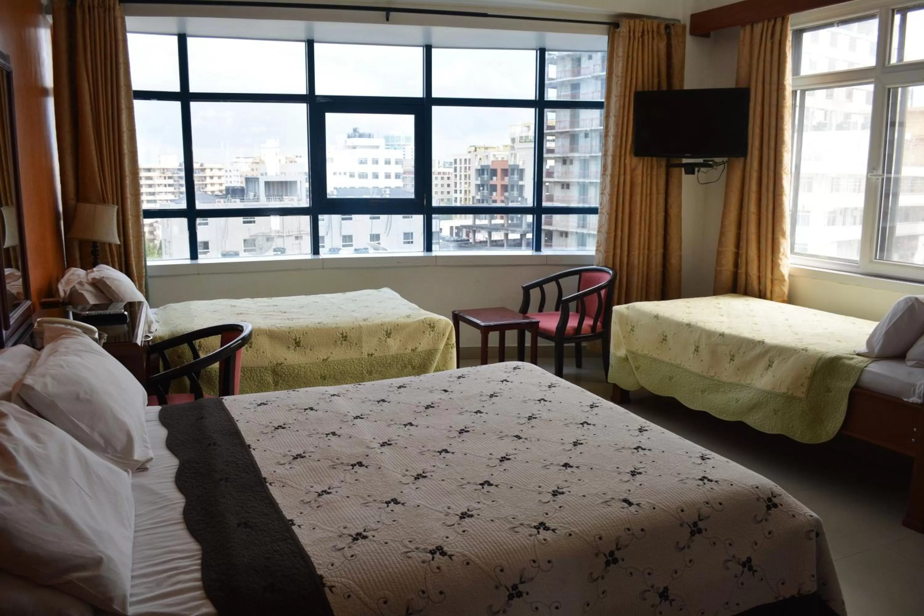 Bed in Rainbow Hotel