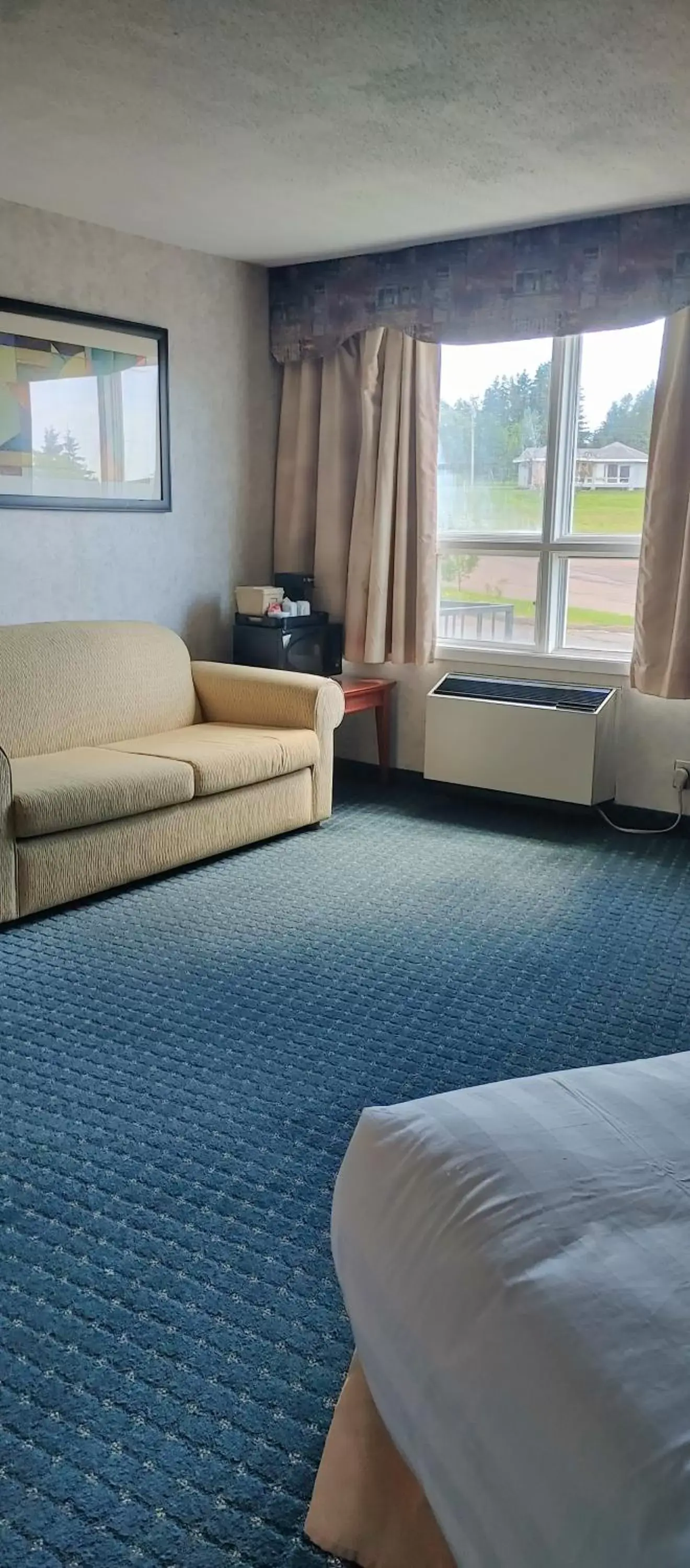Living room, Seating Area in Travelodge by Wyndham Amherst