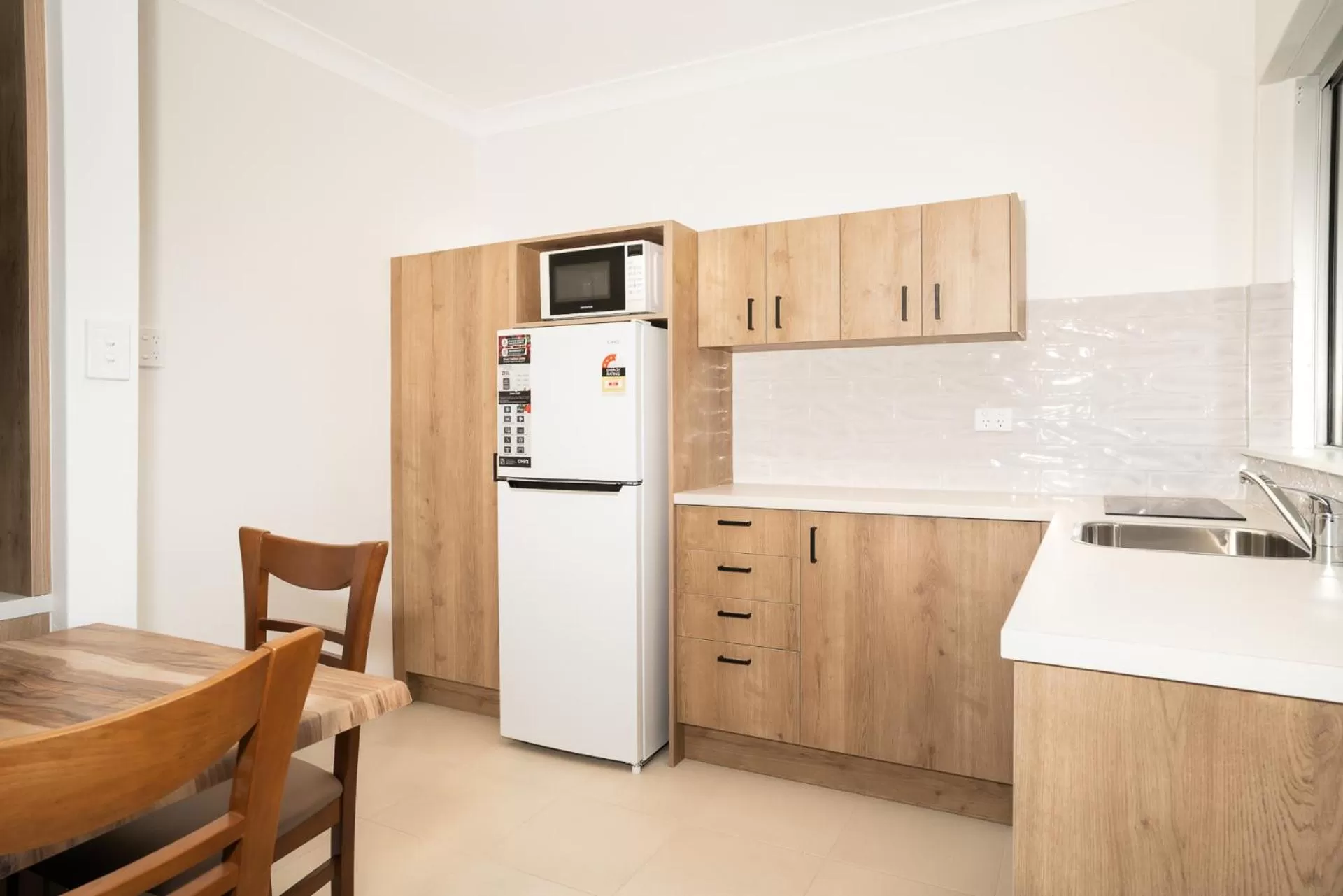 Kitchen or kitchenette in Caribbean Motel