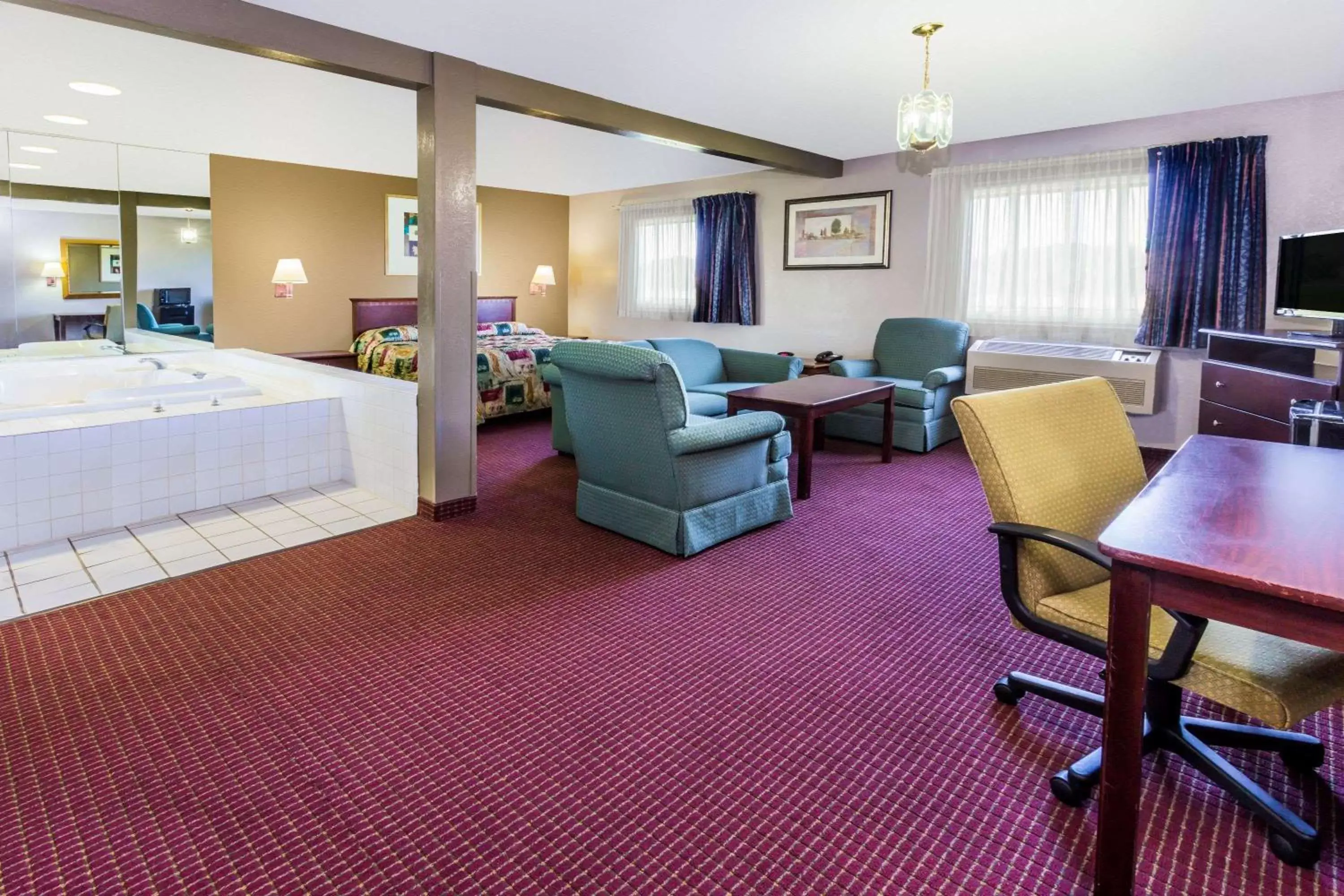 Photo of the whole room, Seating Area in Super 8 by Wyndham Joliet I-55 N/Chicago