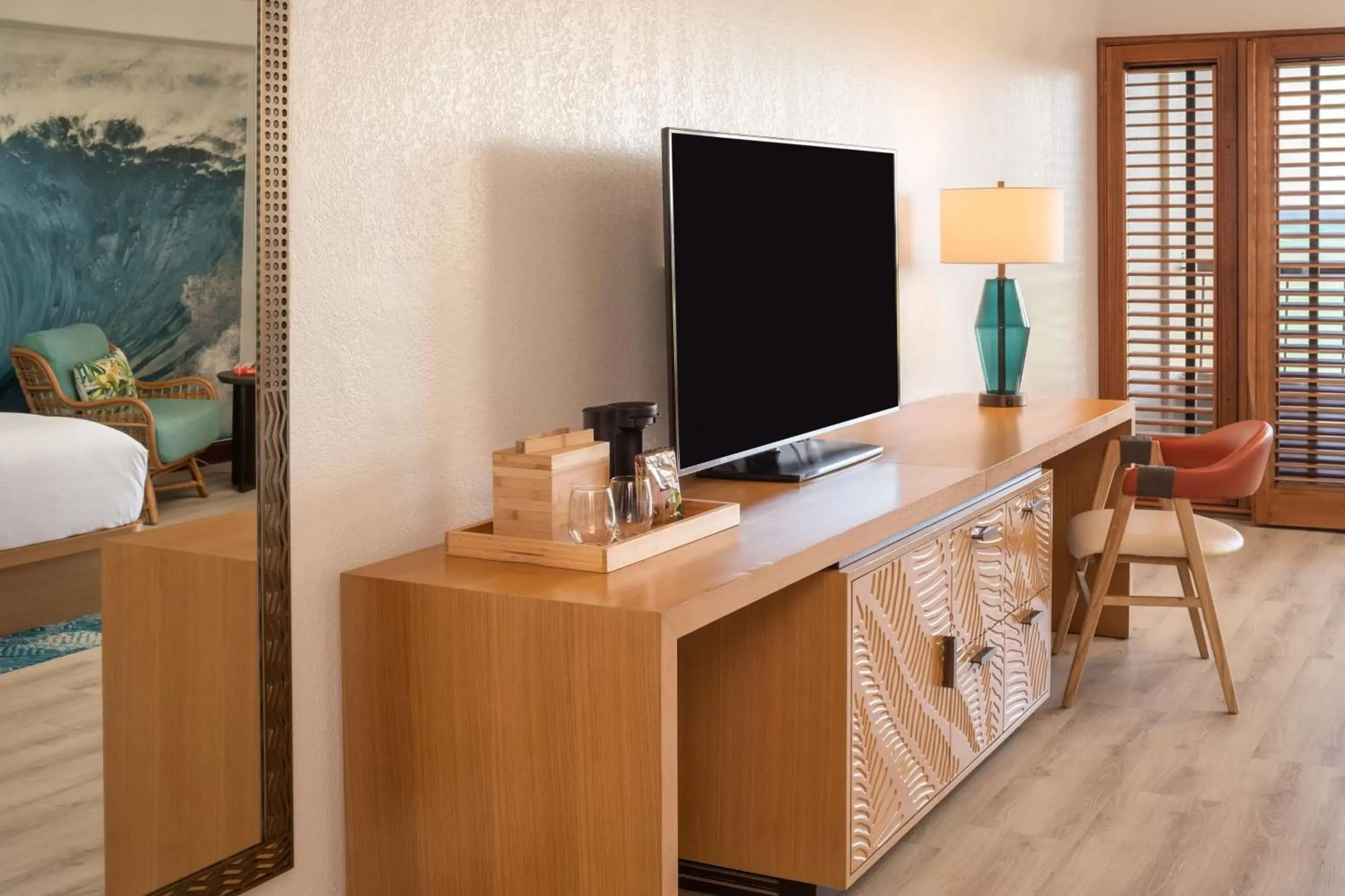 Photo of the whole room, TV/Entertainment Center in Sheraton Kauai Coconut Beach Resort