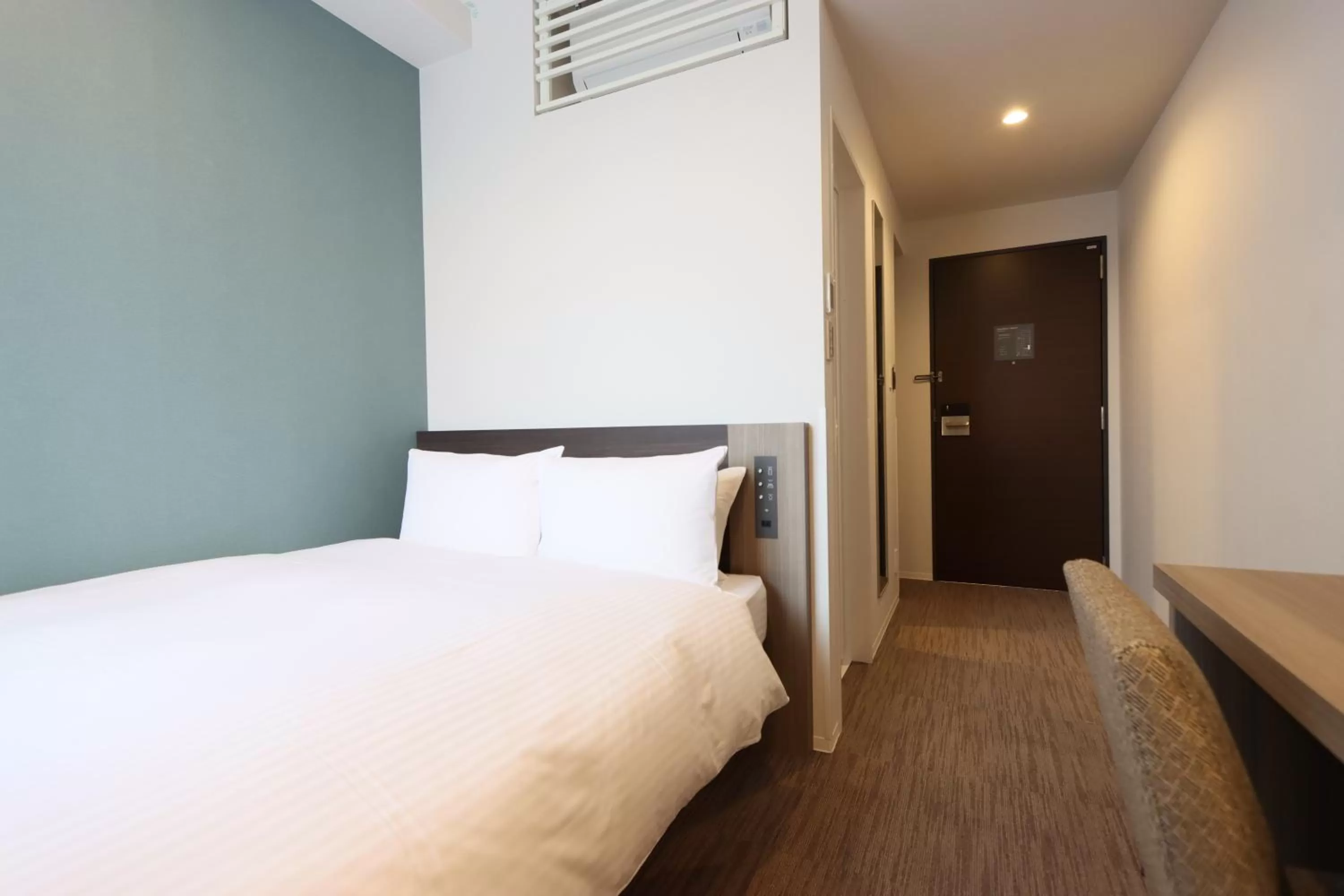 Bed in Wander Kyoto Nanajo