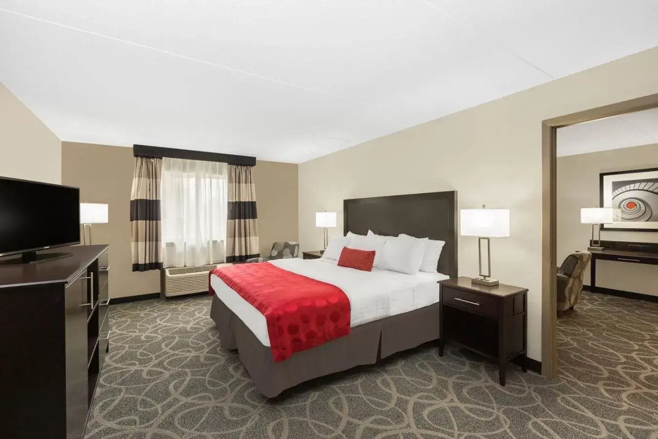 Bed in Ramada by Wyndham Des Moines Airport