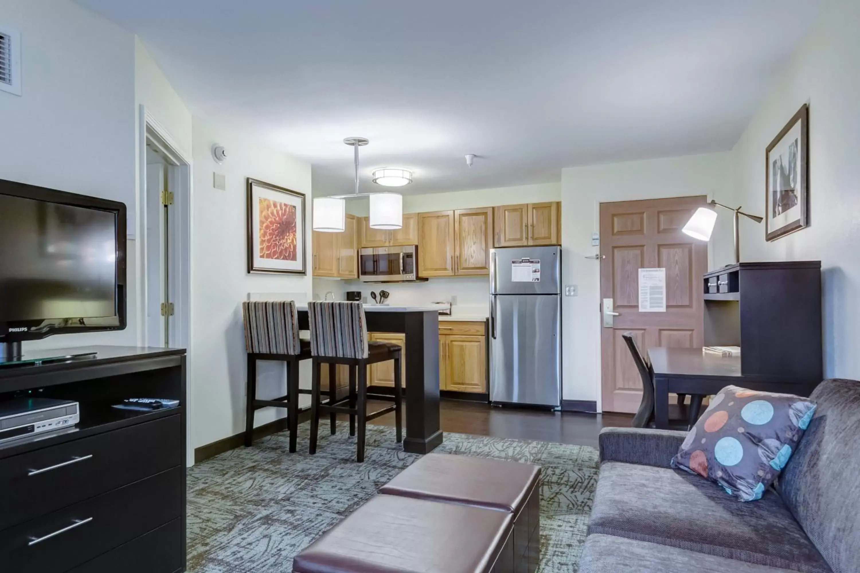 Photo of the whole room, TV/Entertainment Center in Staybridge Suites O'Fallon Chesterfield, an IHG Hotel