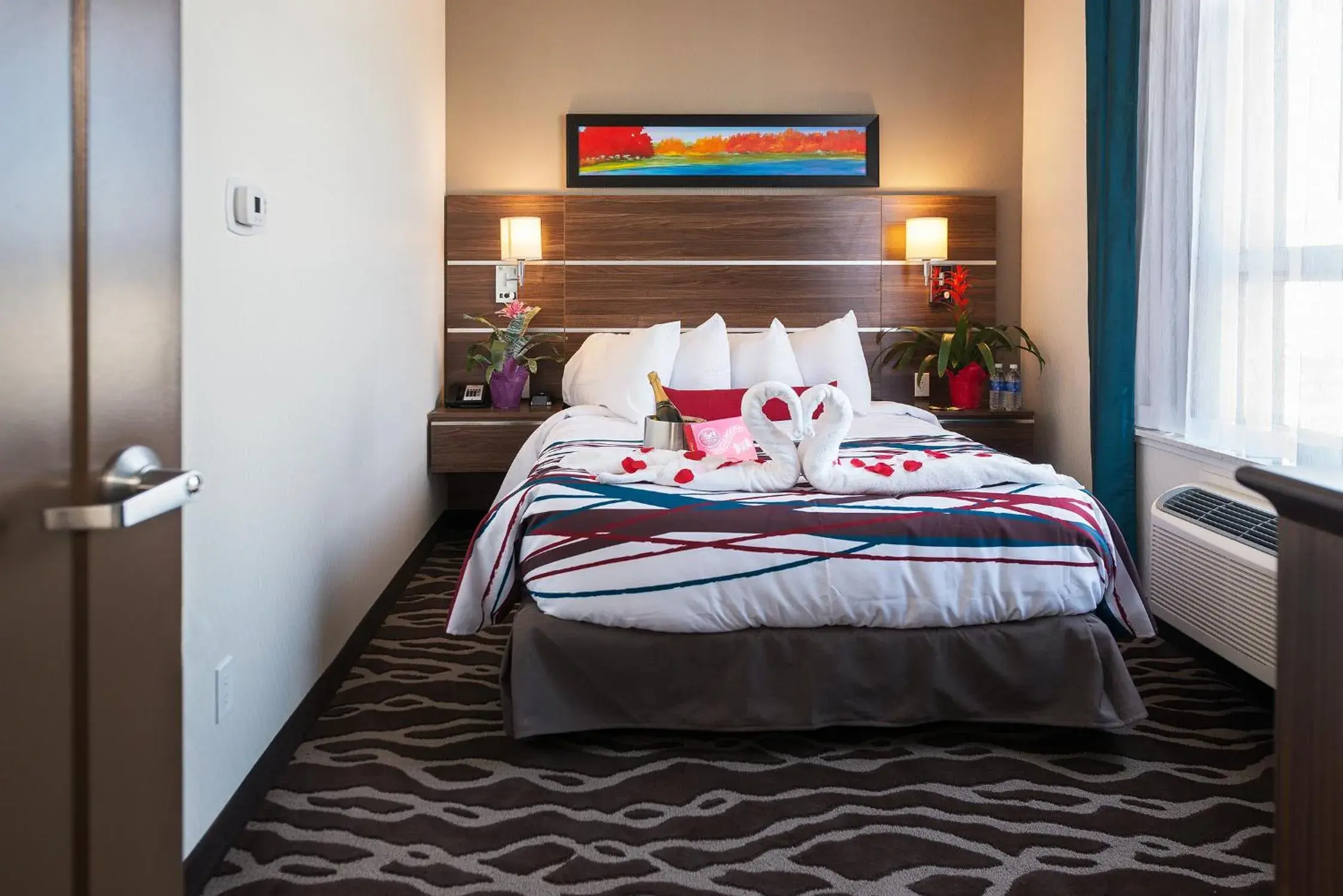 Bedroom, Bed in Encore Suites by Service Plus Inns