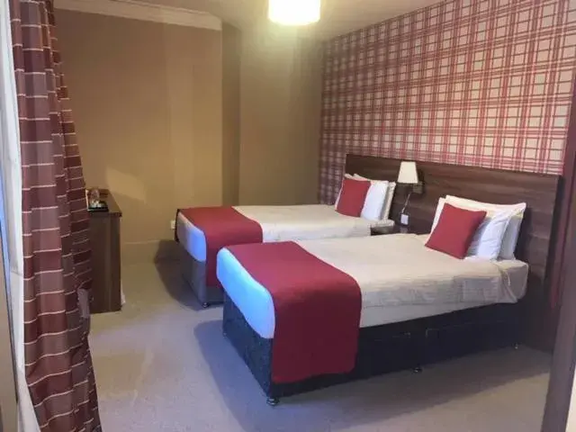 Bed in Chieftain Hotel