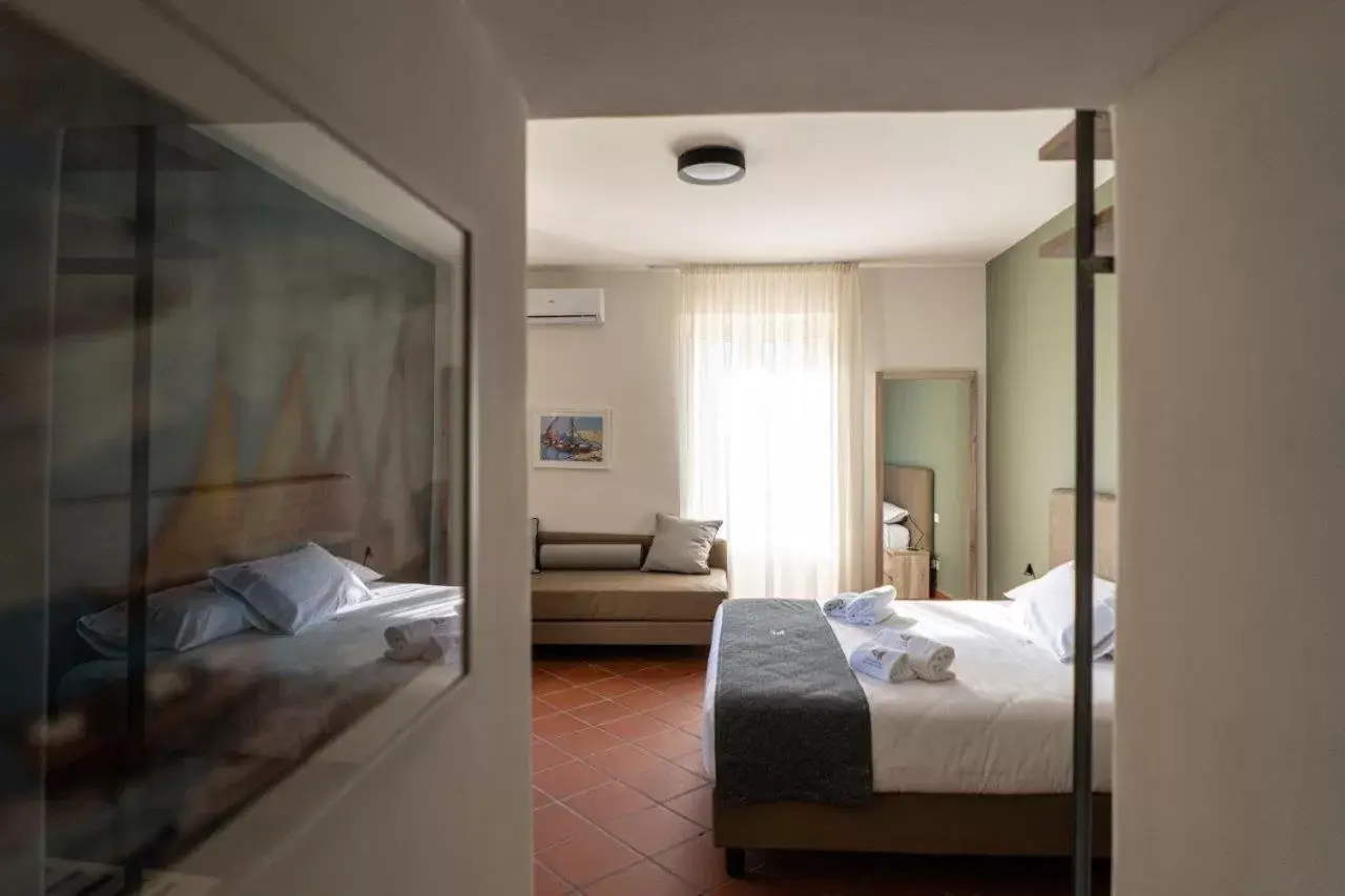 Bed in Il Picciolo Etna Golf Resort & Spa