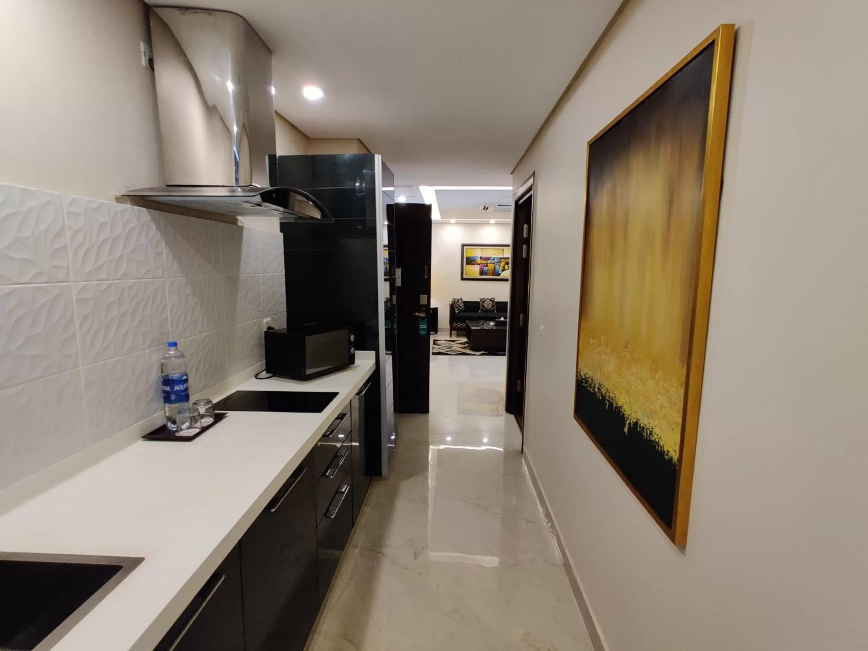 Kitchen/Kitchenette in Ramada by Wyndham Lahore Gulberg II