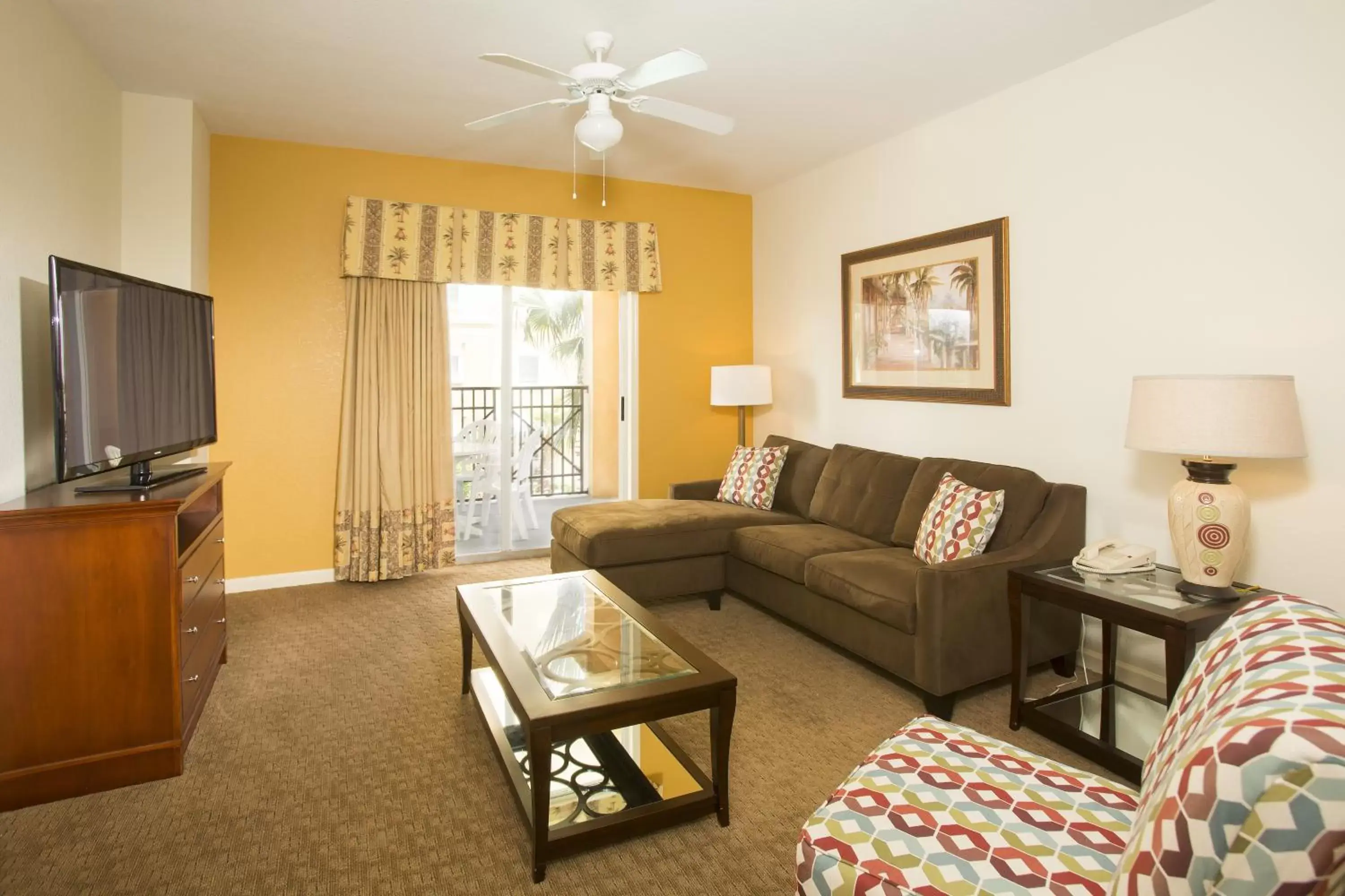 TV and multimedia, Seating Area in Lake Buena Vista Resort Village and Spa, a staySky Hotel & Resort Near Disney