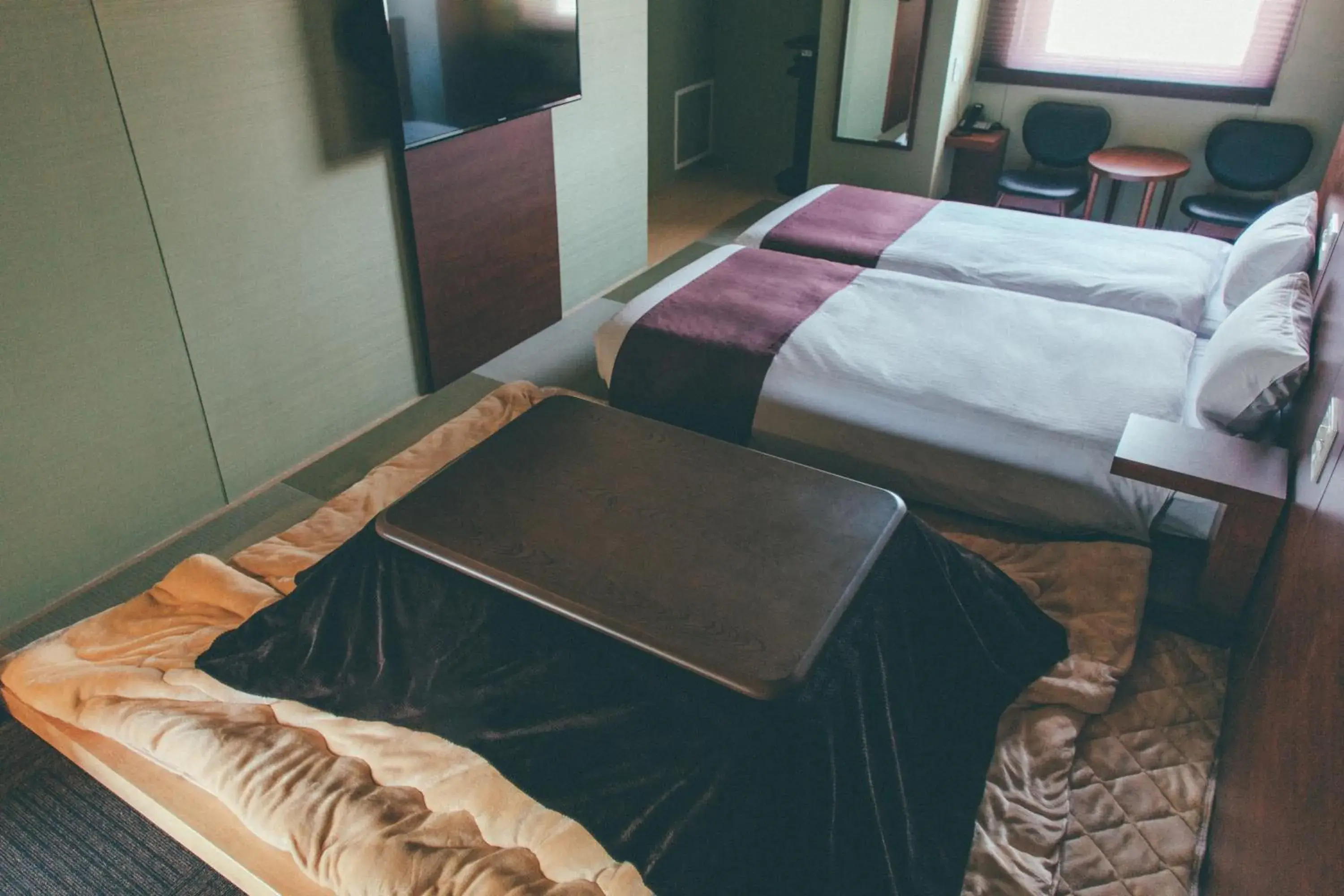Bed in Hotel Kuretakeso Takayama Ekimae