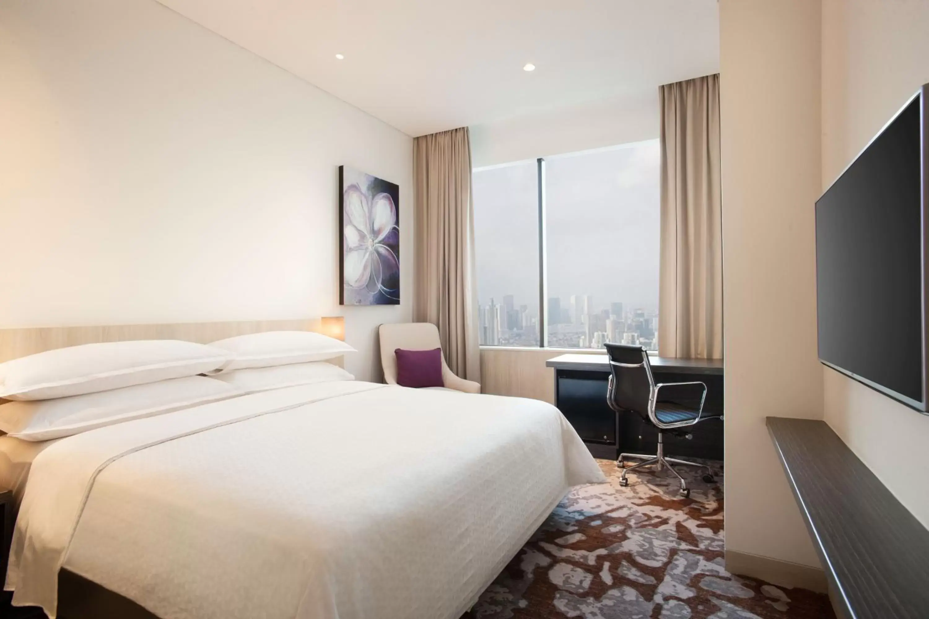 Bed in Four Points by Sheraton Jakarta Thamrin