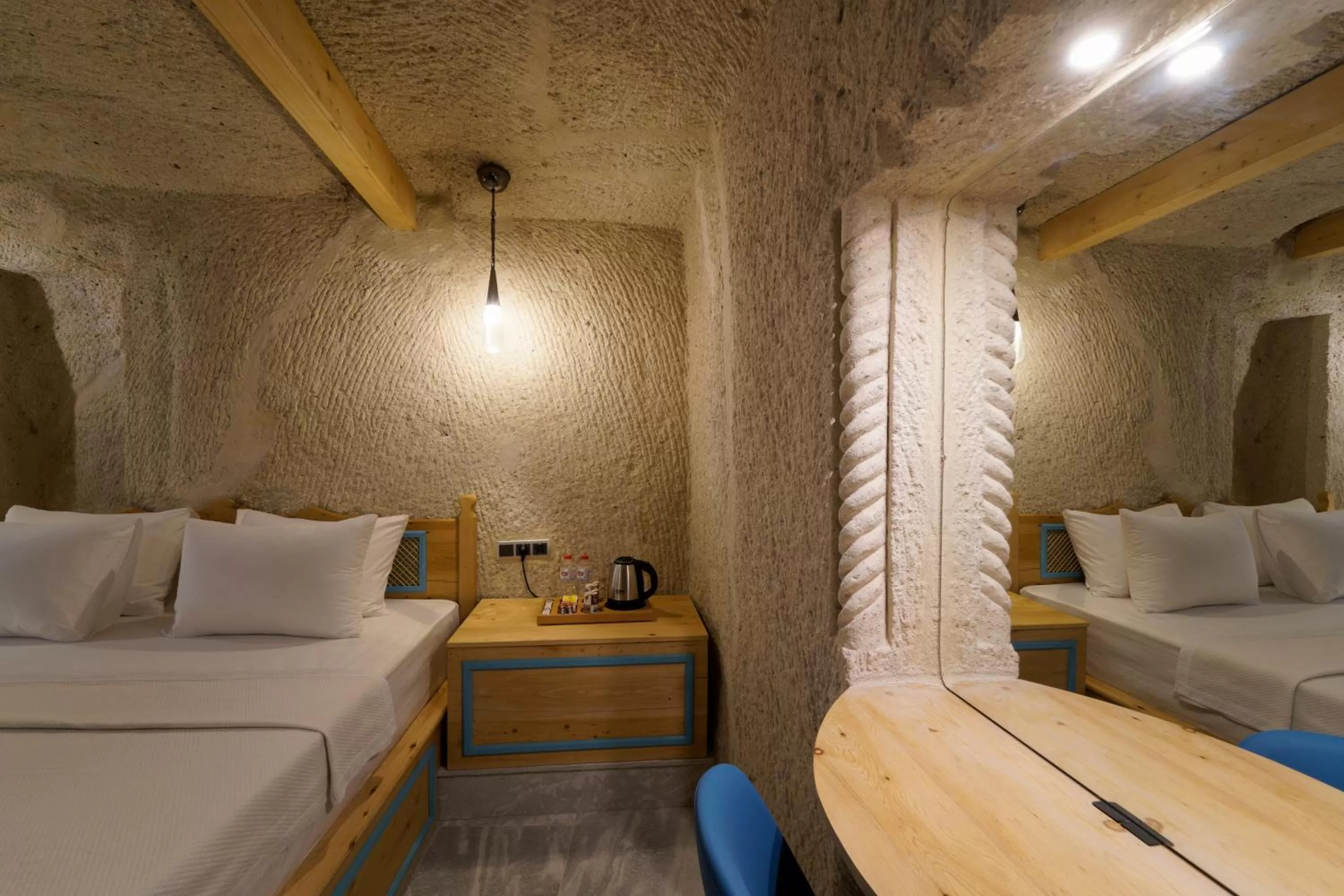 Bed in The Niche Cave Hotel