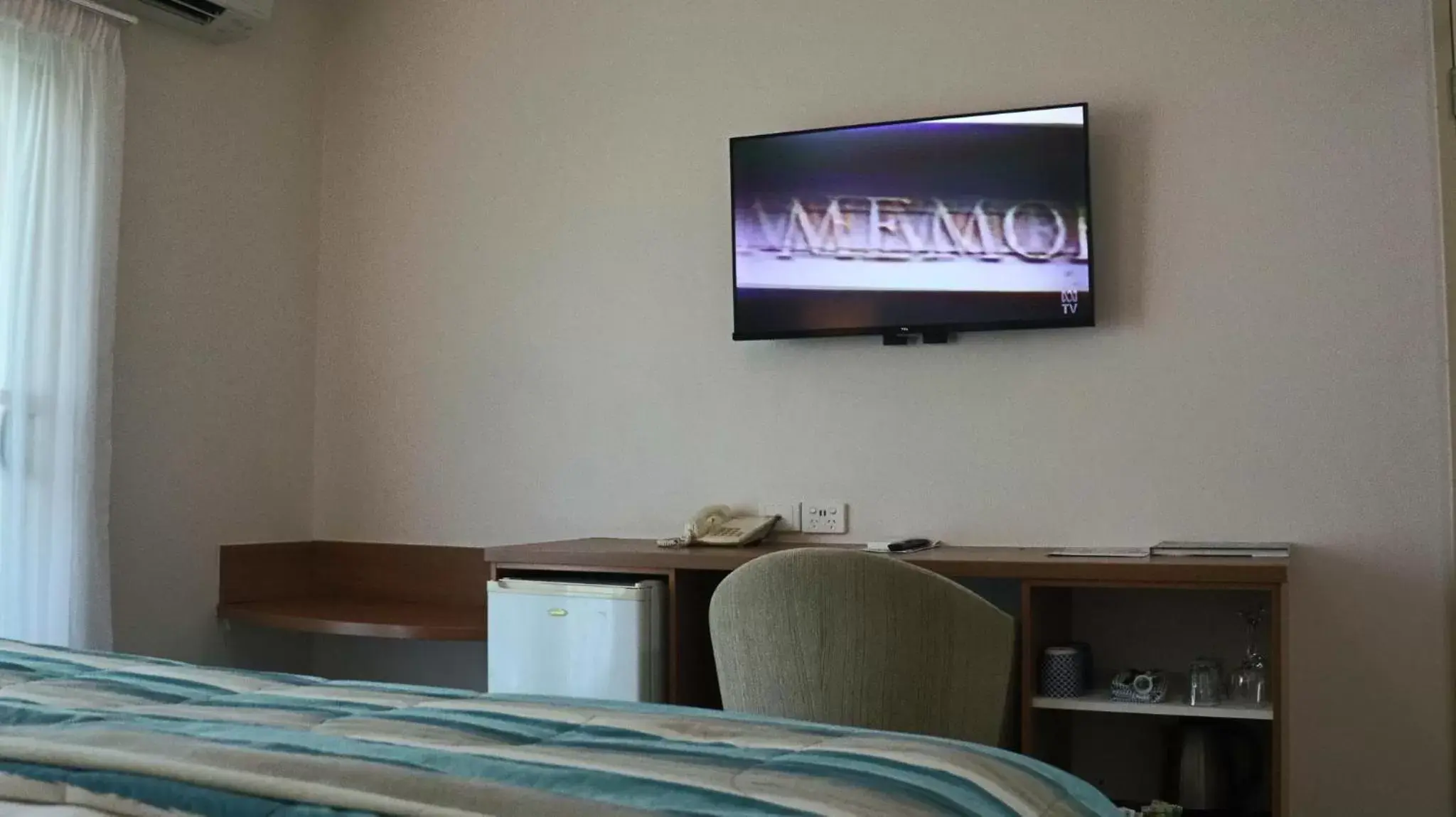 TV and multimedia, TV/Entertainment Center in Heritage Cairns Hotel