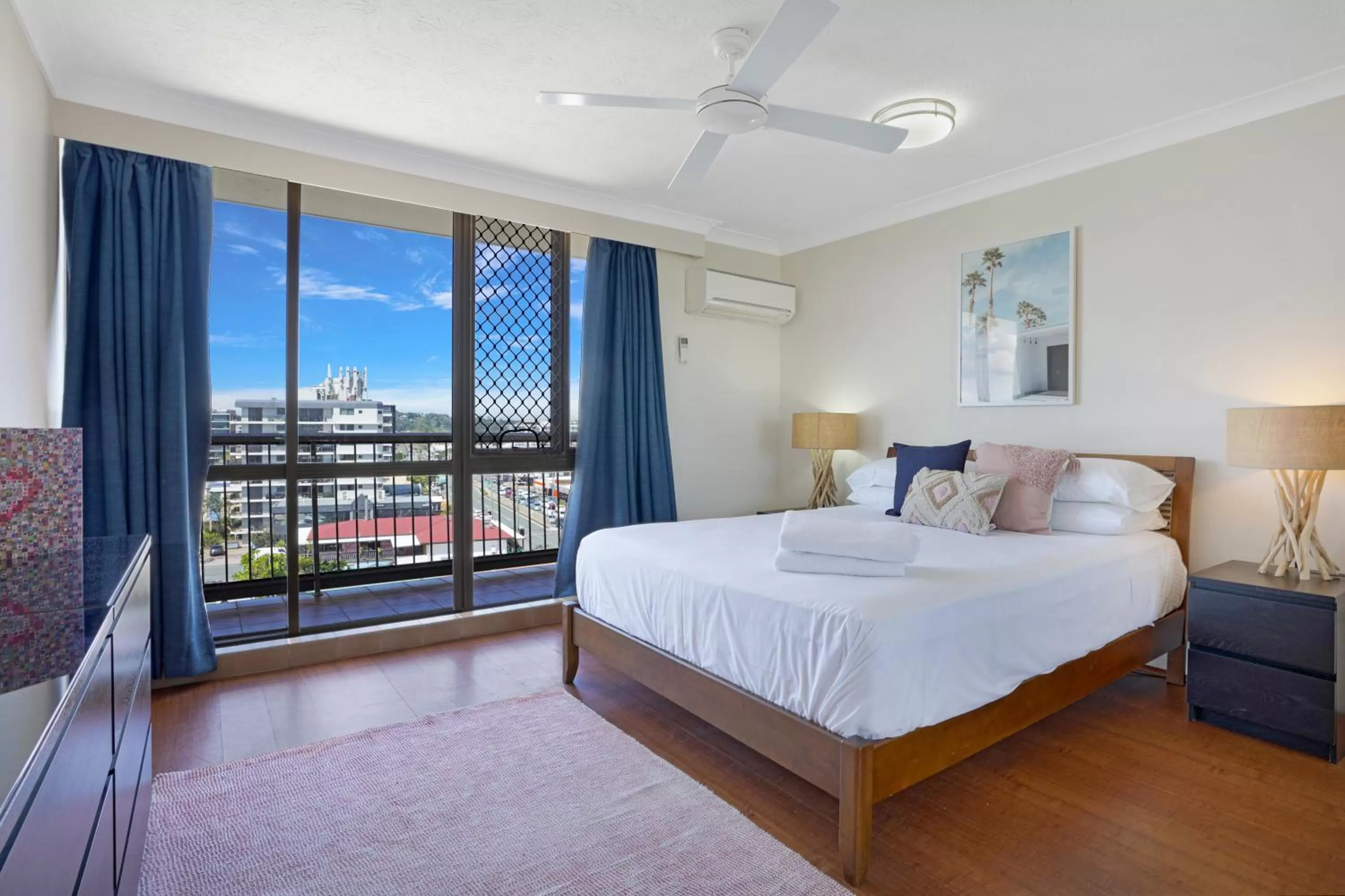 Bed in Beach Palms Holiday Apartments