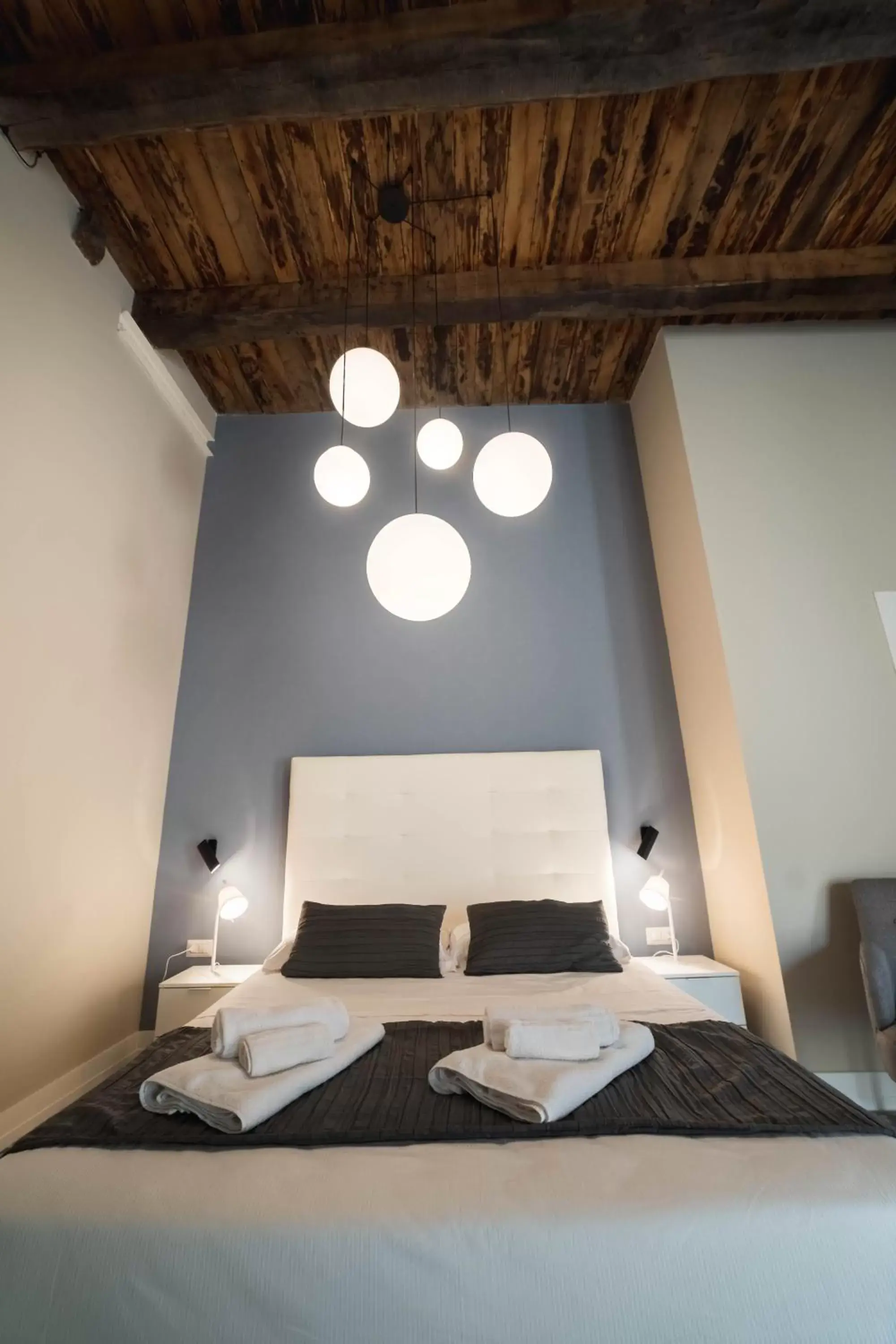 Bed in Palazzo Paladini - Luxury Suites in the Heart of the Old Town