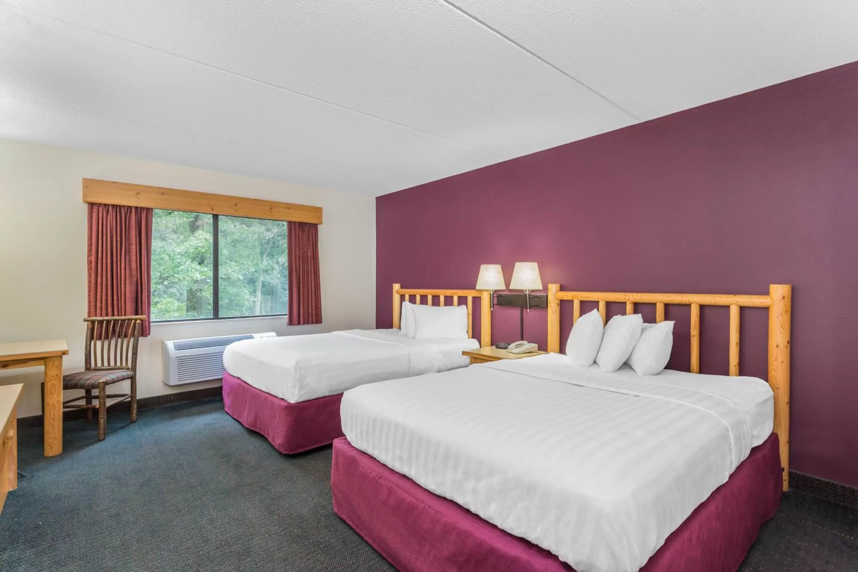 Bedroom, Bed in AmericInn by Wyndham Wisconsin Dells