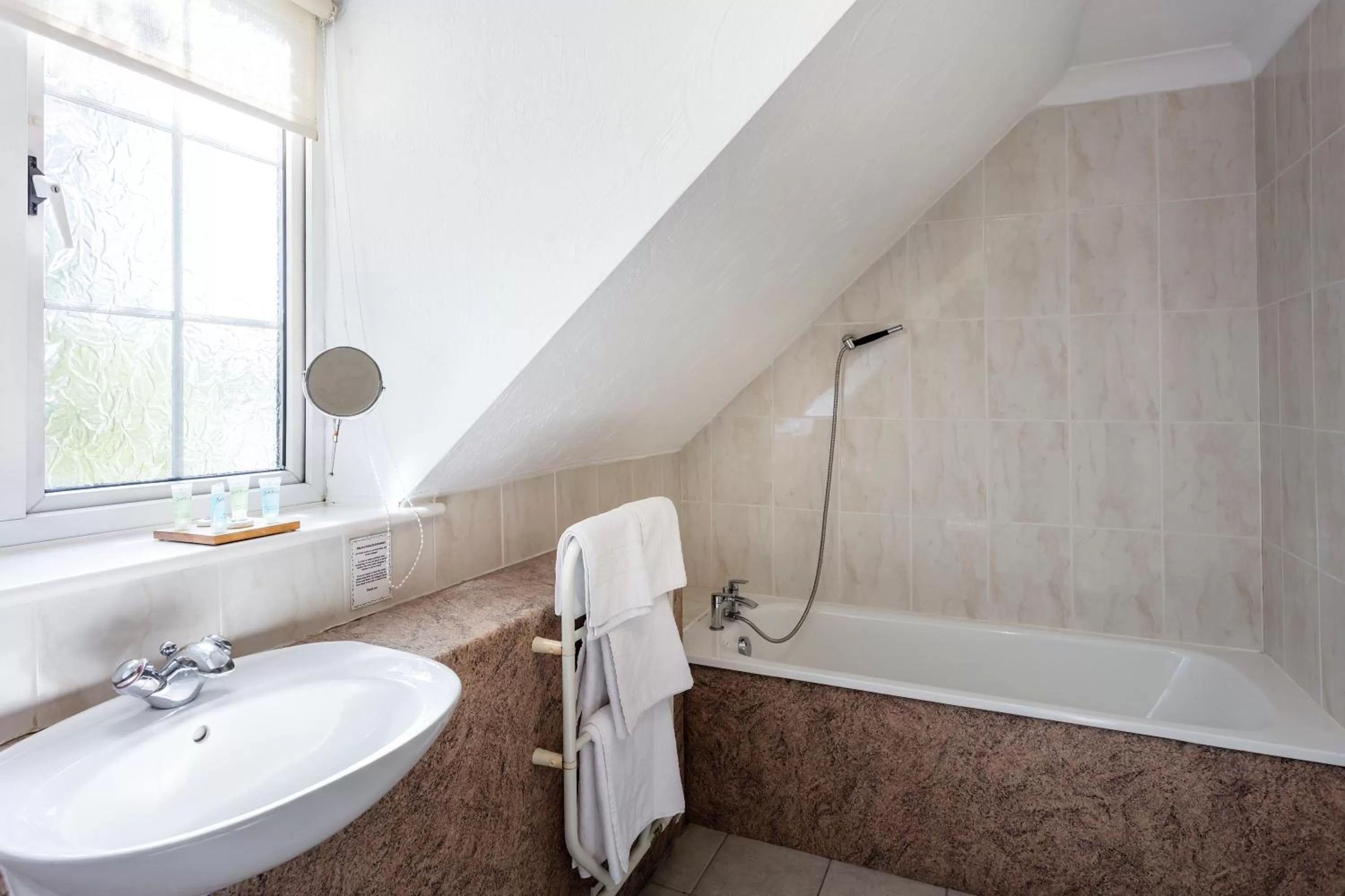 Shower in Roydon Marina Village Hotel