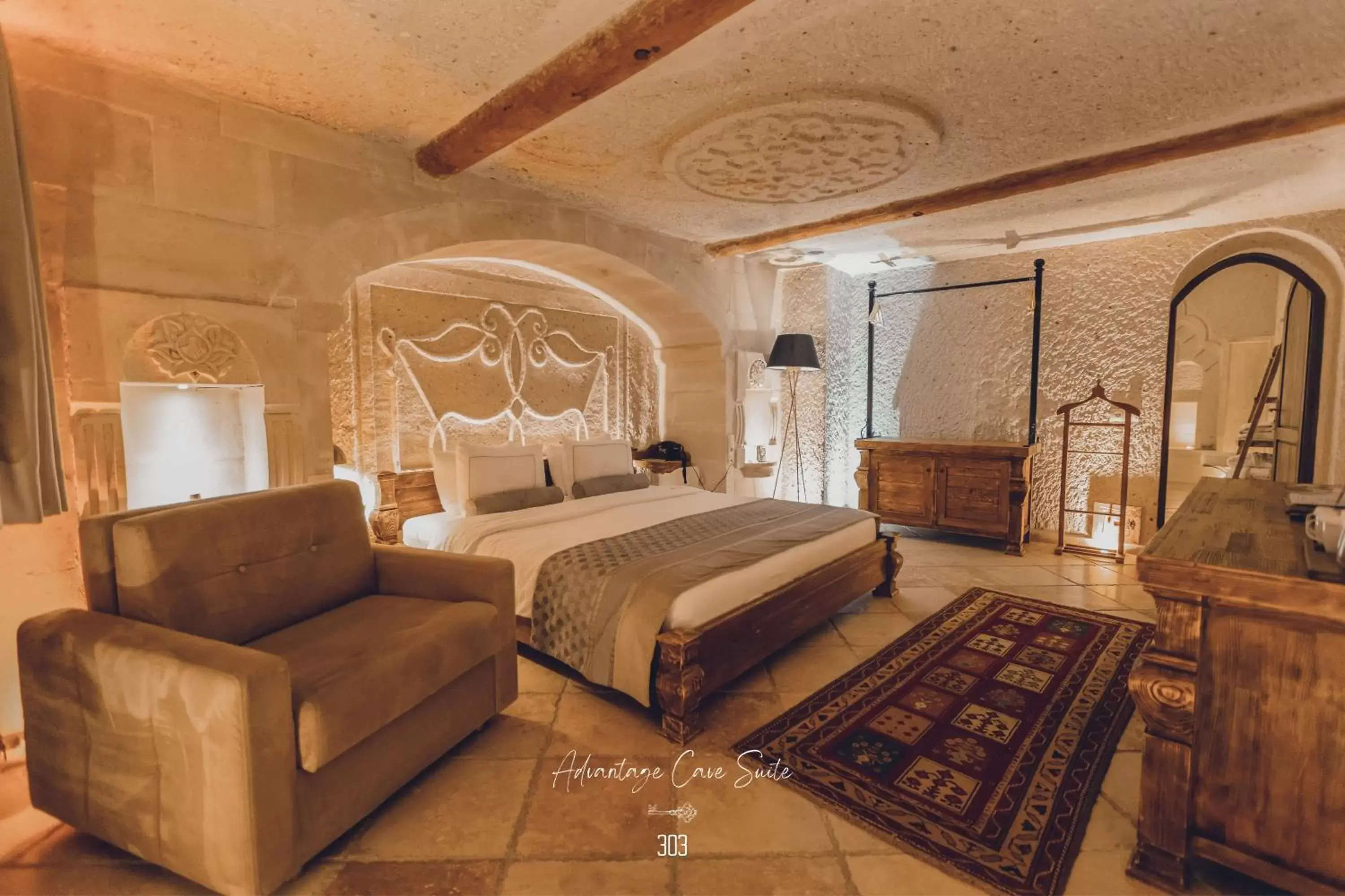 Bed in Nino Cave Suites