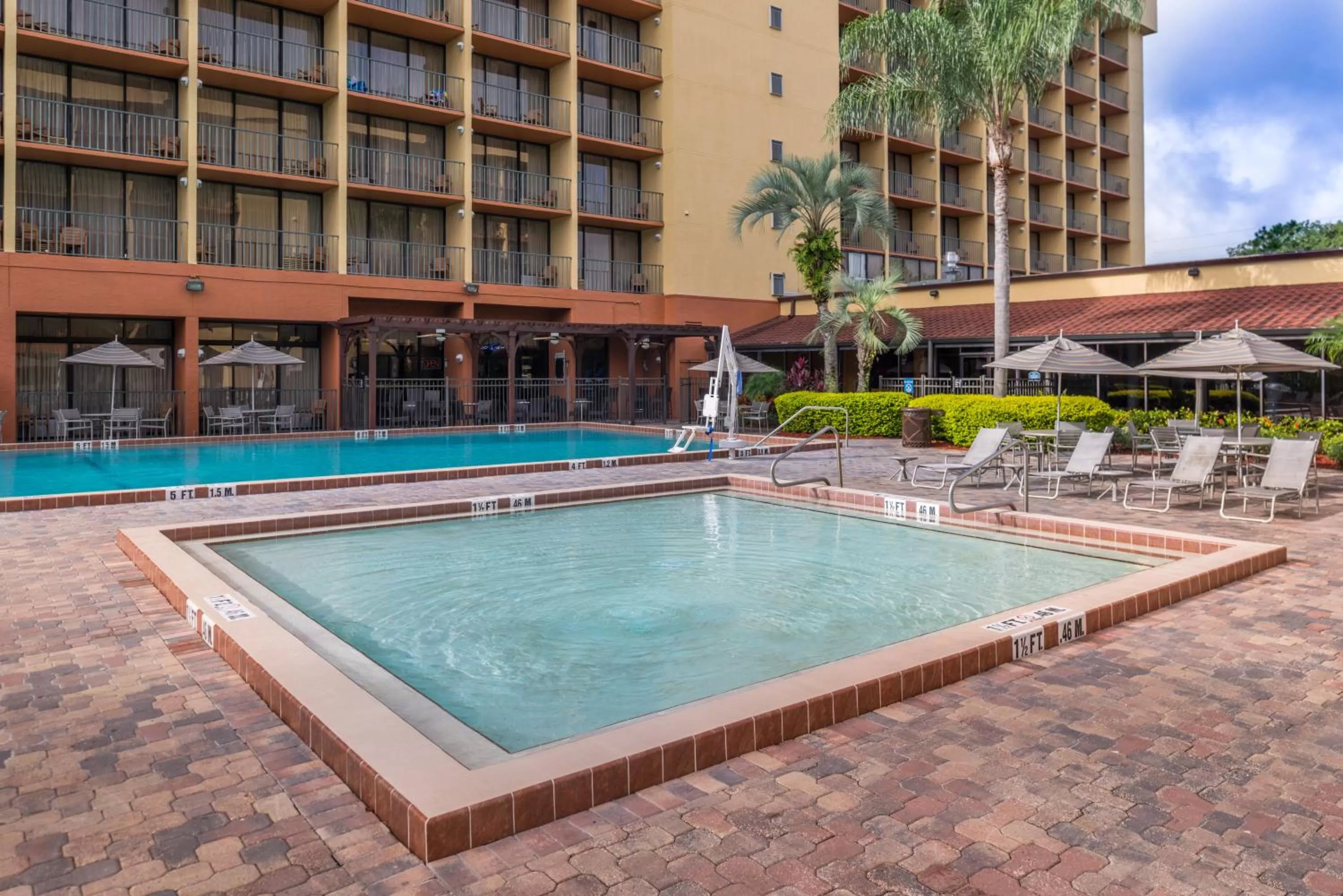 Swimming pool in Holiday Inn & Suites Orlando SW - Celebration Area by IHG