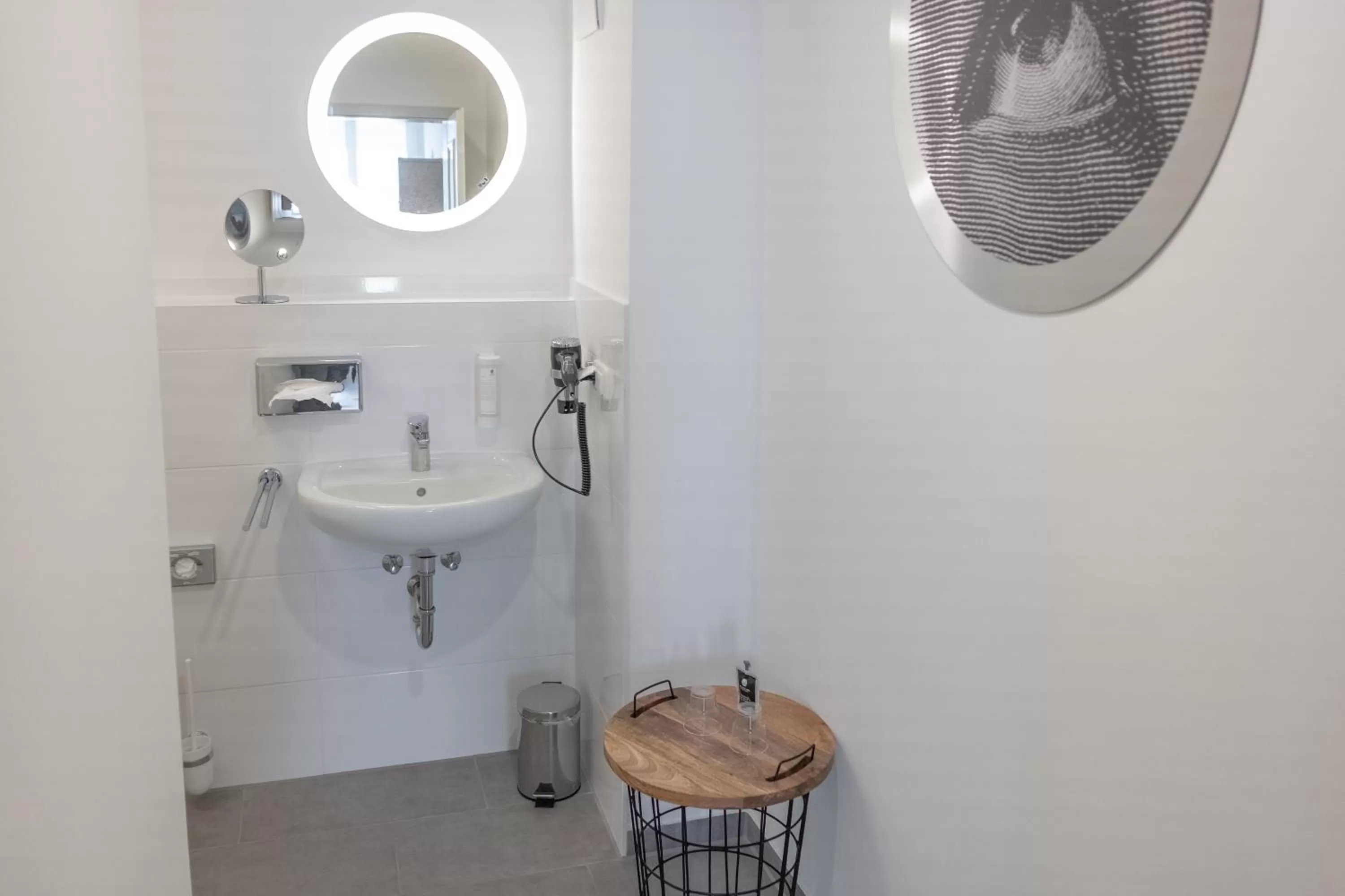 Bathroom in ANA Living Augsburg City Center by Arthotel ANA - Self-Service-Hotel