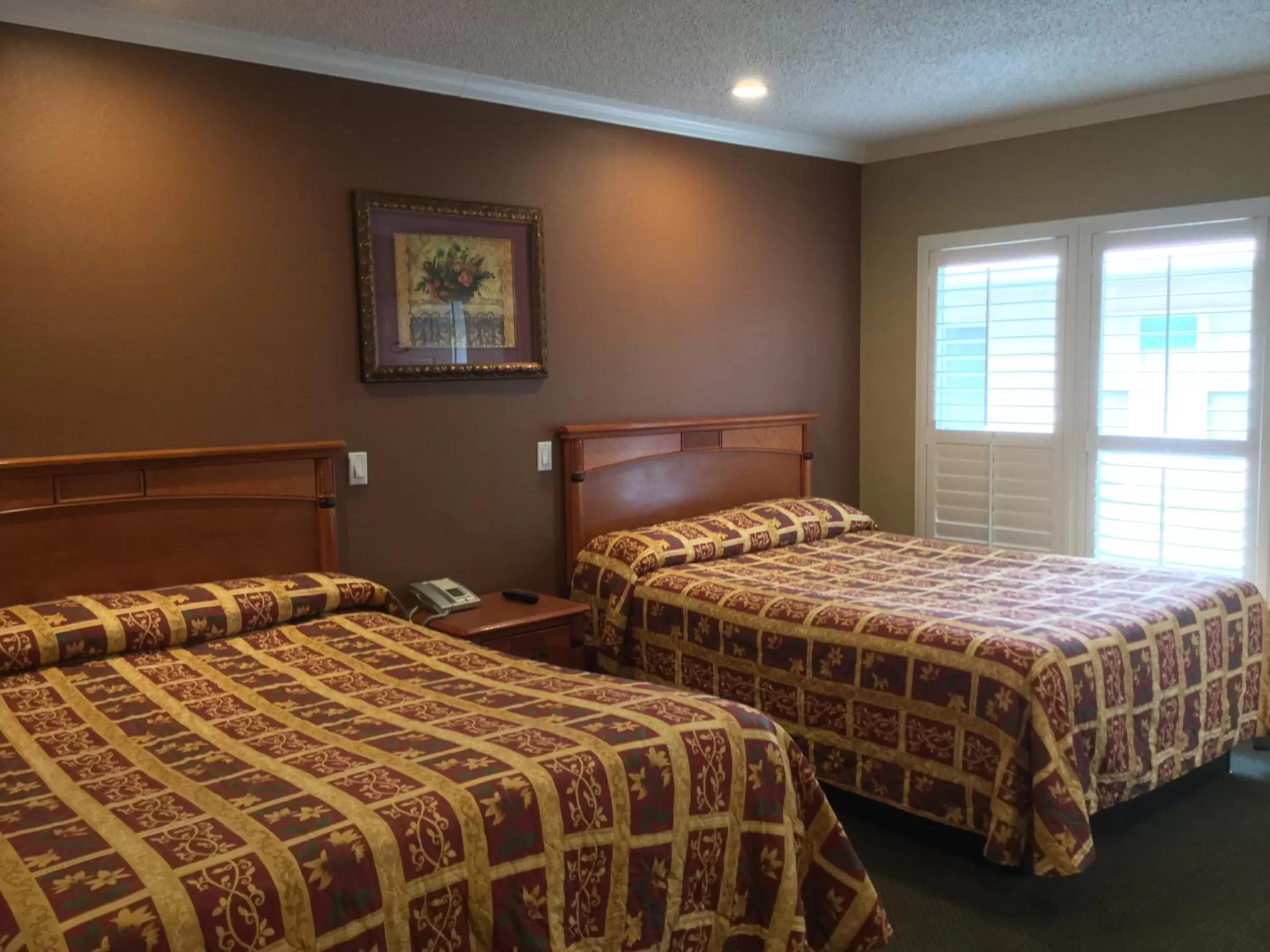 Bed in Bevonshire Lodge Motel