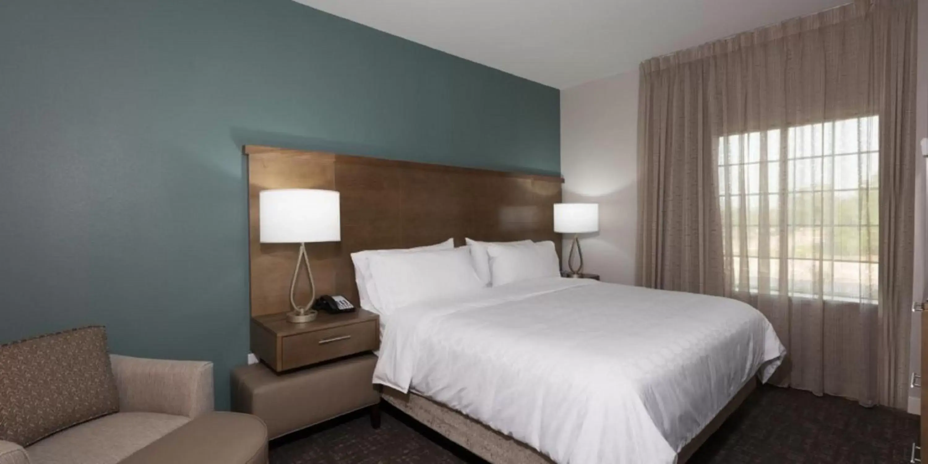 Photo of the whole room, Bed in Staybridge Suites Houston East - Baytown, an IHG Hotel