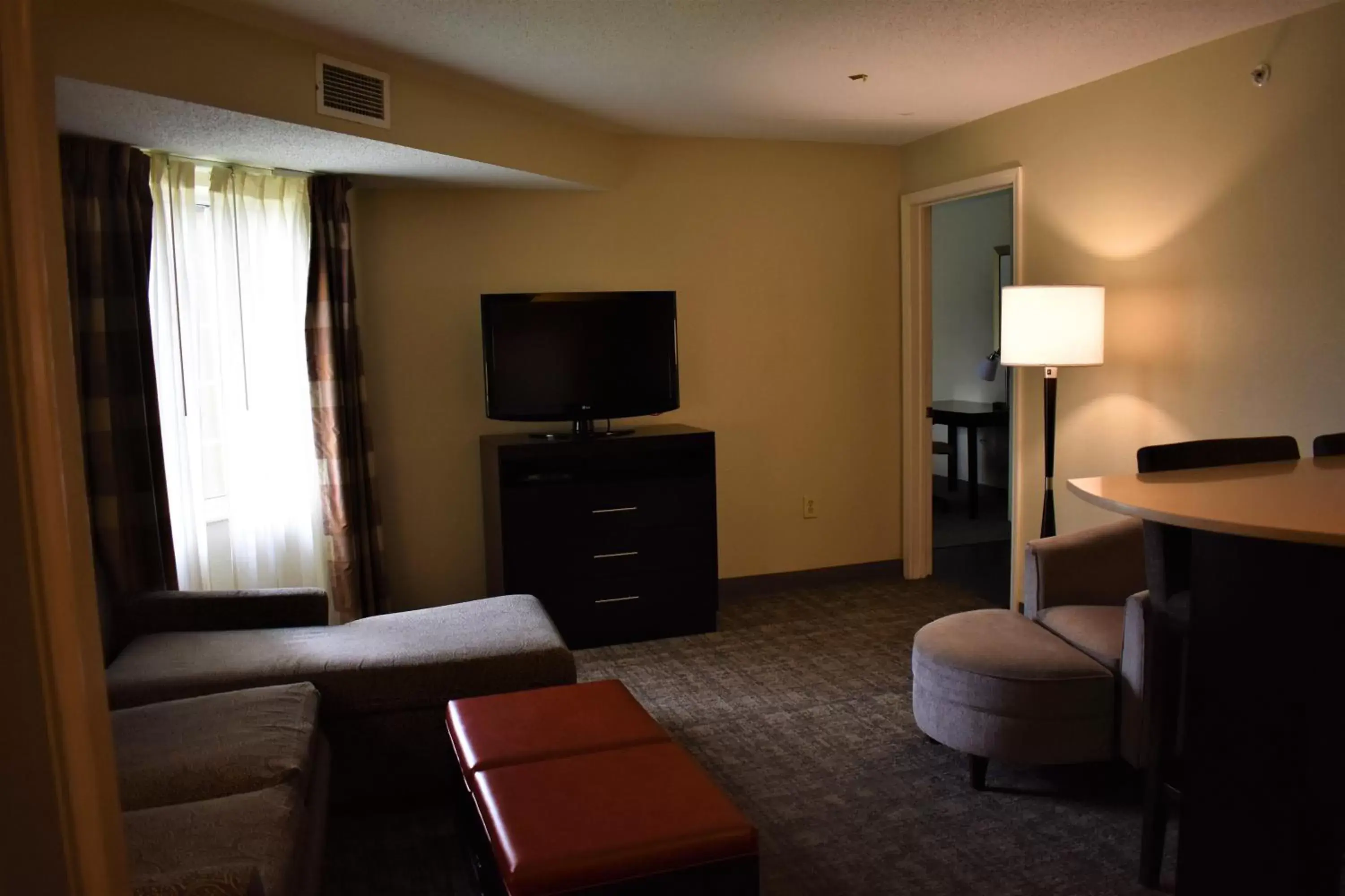 Living room, Seating Area in Staybridge Suites Cranbury - South Brunswick, an IHG Hotel