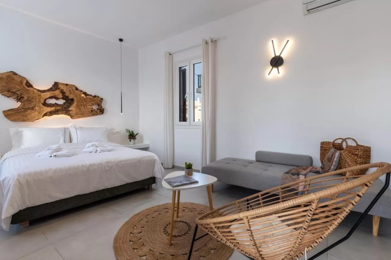 Bed in Sunset Paraportiani Rooms