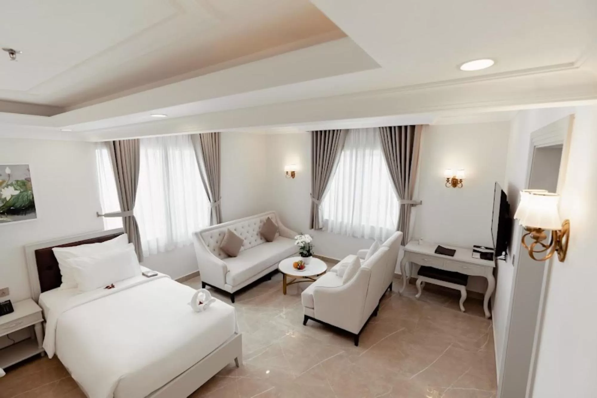 TV and multimedia, Seating Area in MerPerle Beach Hotel