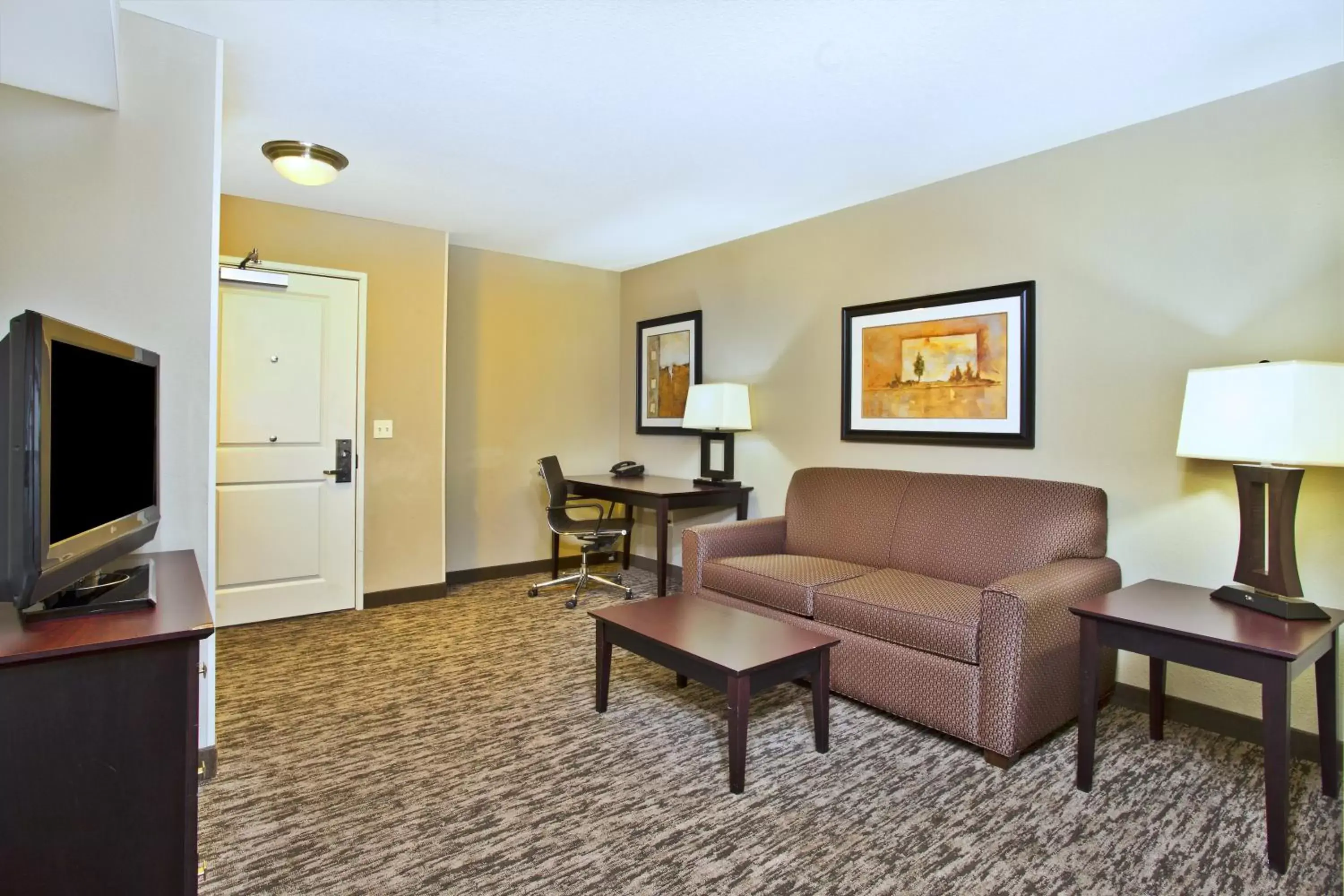 Photo of the whole room, Seating Area in Holiday Inn & Suites Green Bay Stadium, an IHG Hotel