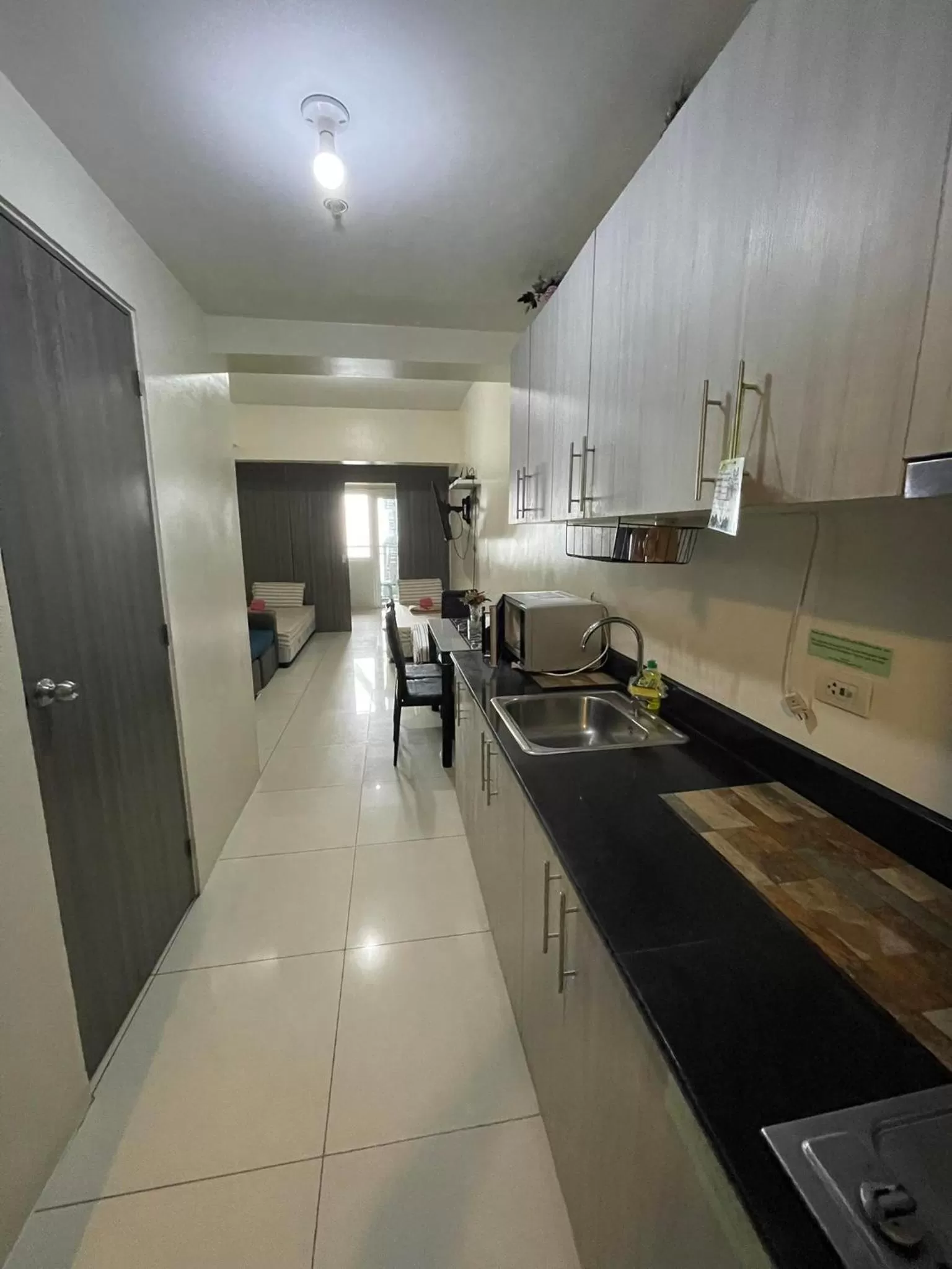Kitchen or kitchenette, Kitchen/Kitchenette in Green Residences Staycation by PBYY