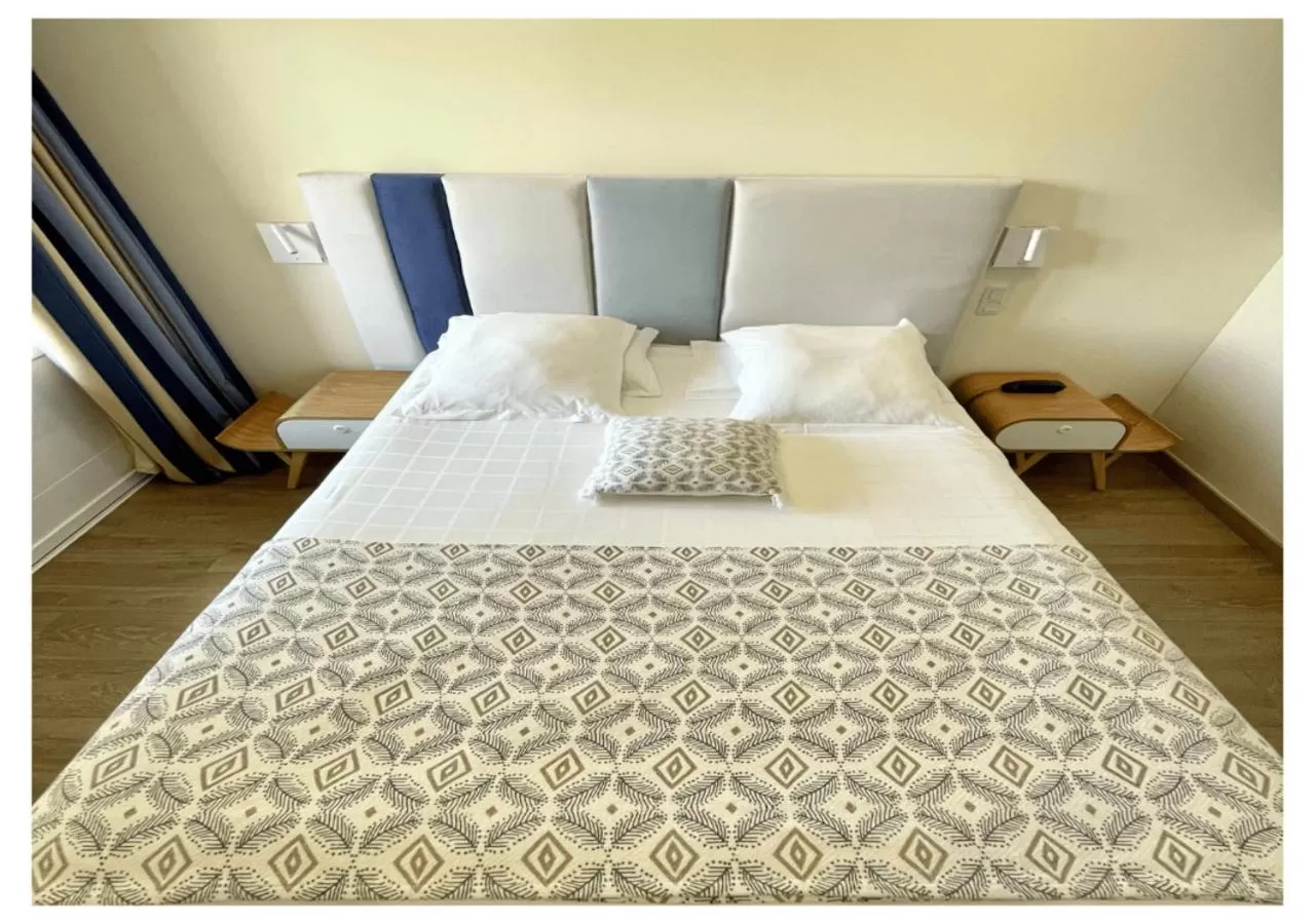 Bed in Ostella Spa & Resort