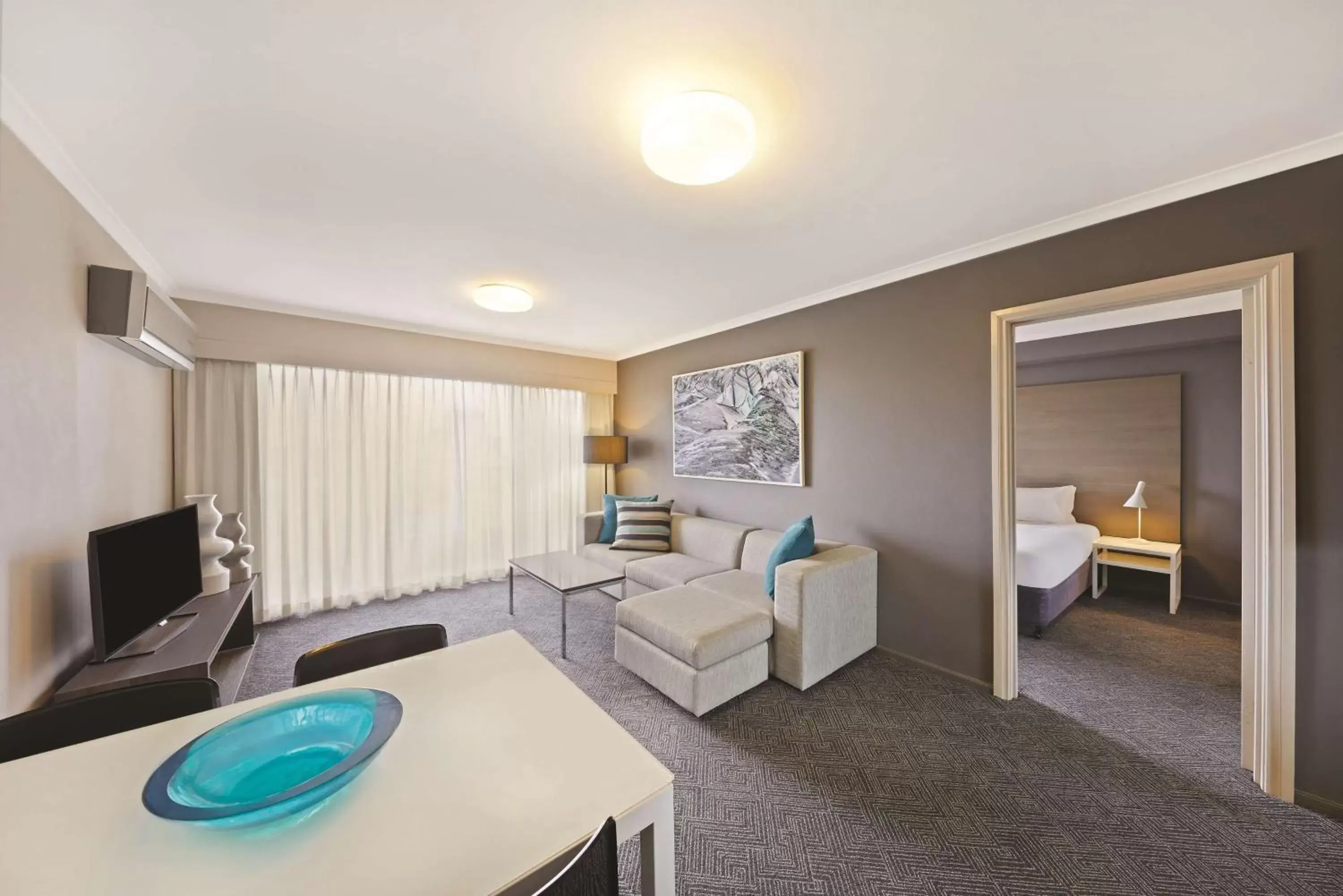 Bedroom, Seating Area in Adina Apartment Hotel Sydney Surry Hills