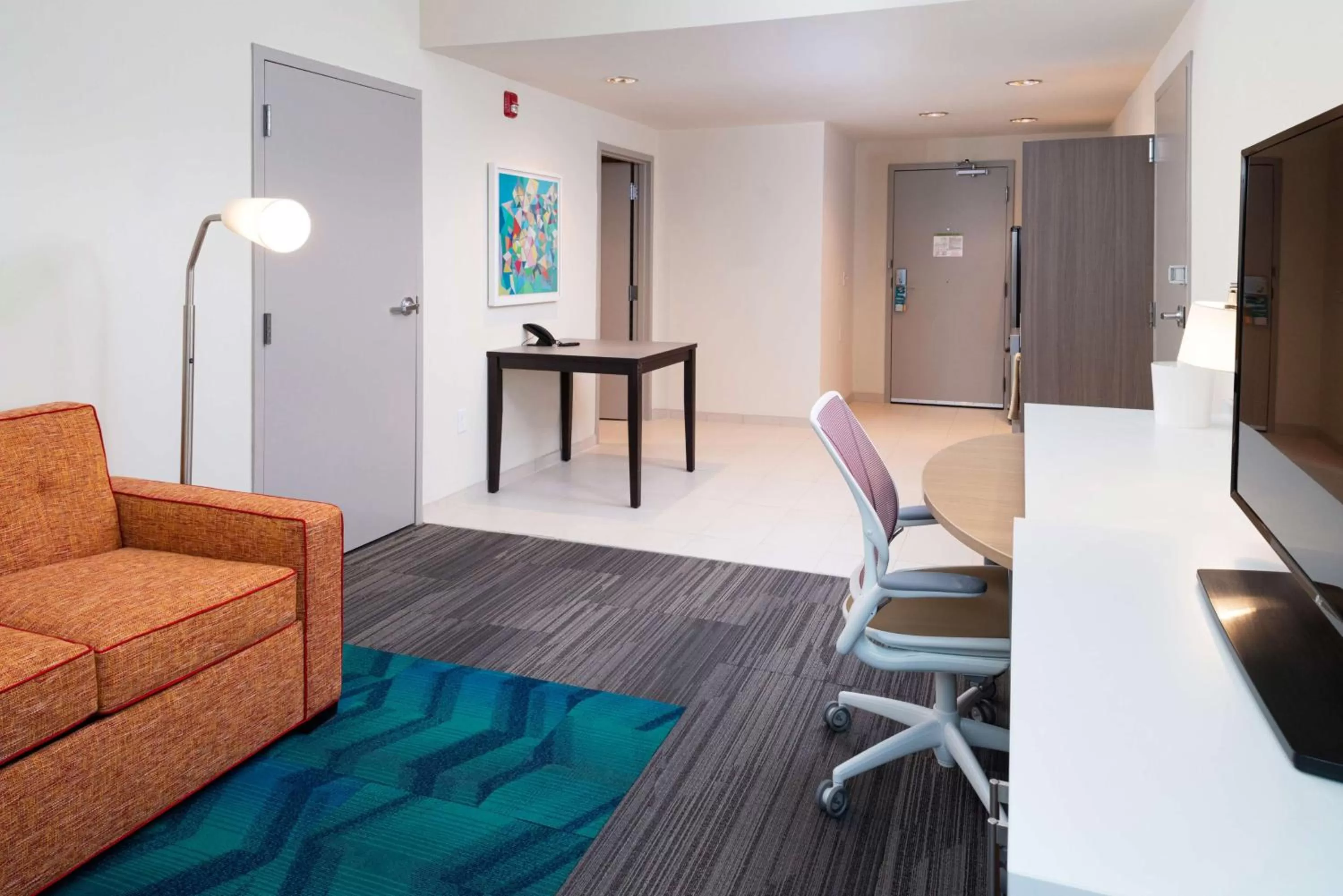 Living room in Home2 Suites By Hilton Charlotte Mooresville, Nc